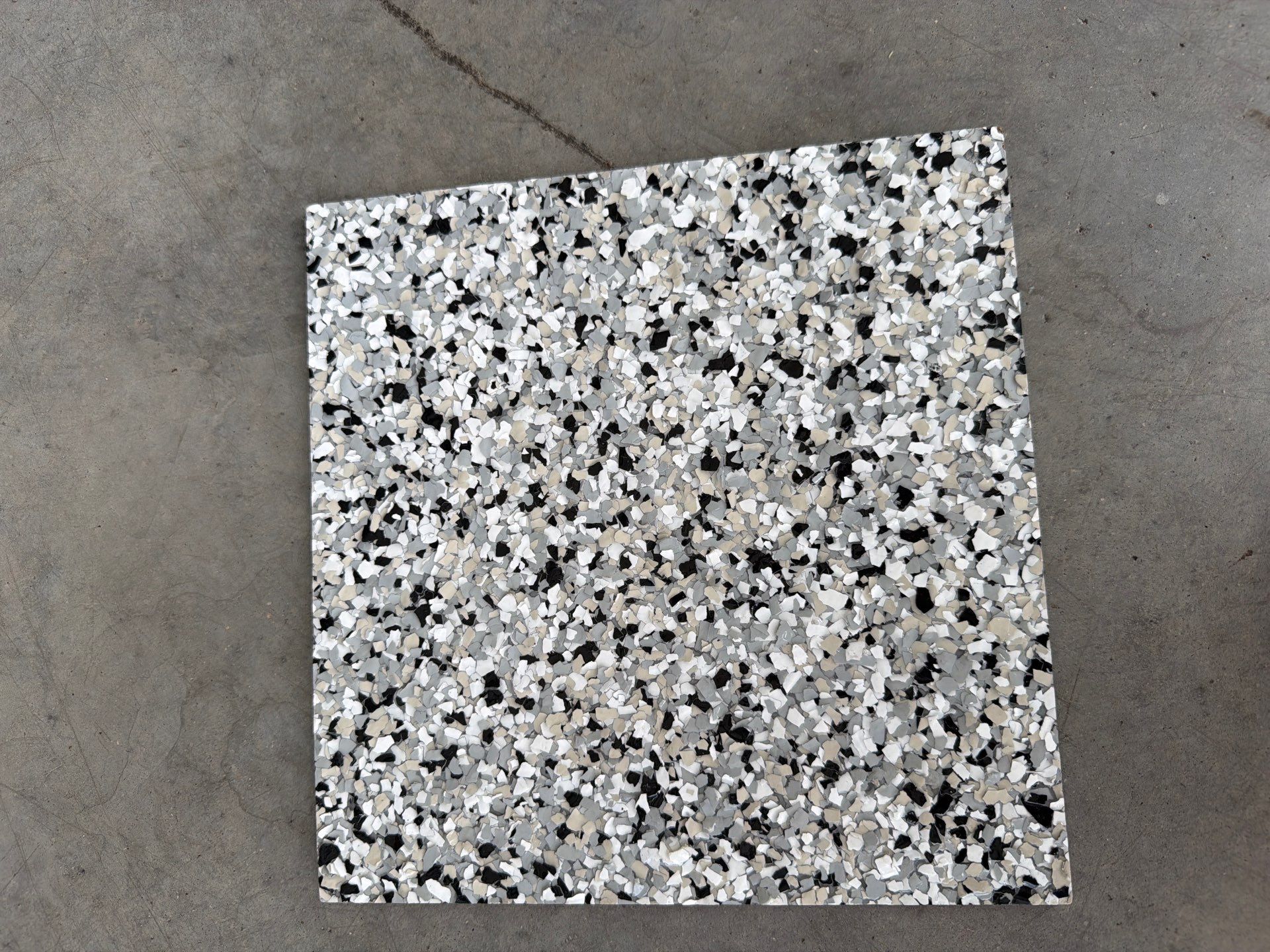 Cabin Fever Garage Floor Coating in Sioux Falls by Select Painting, Coatings & Garage Cabinets