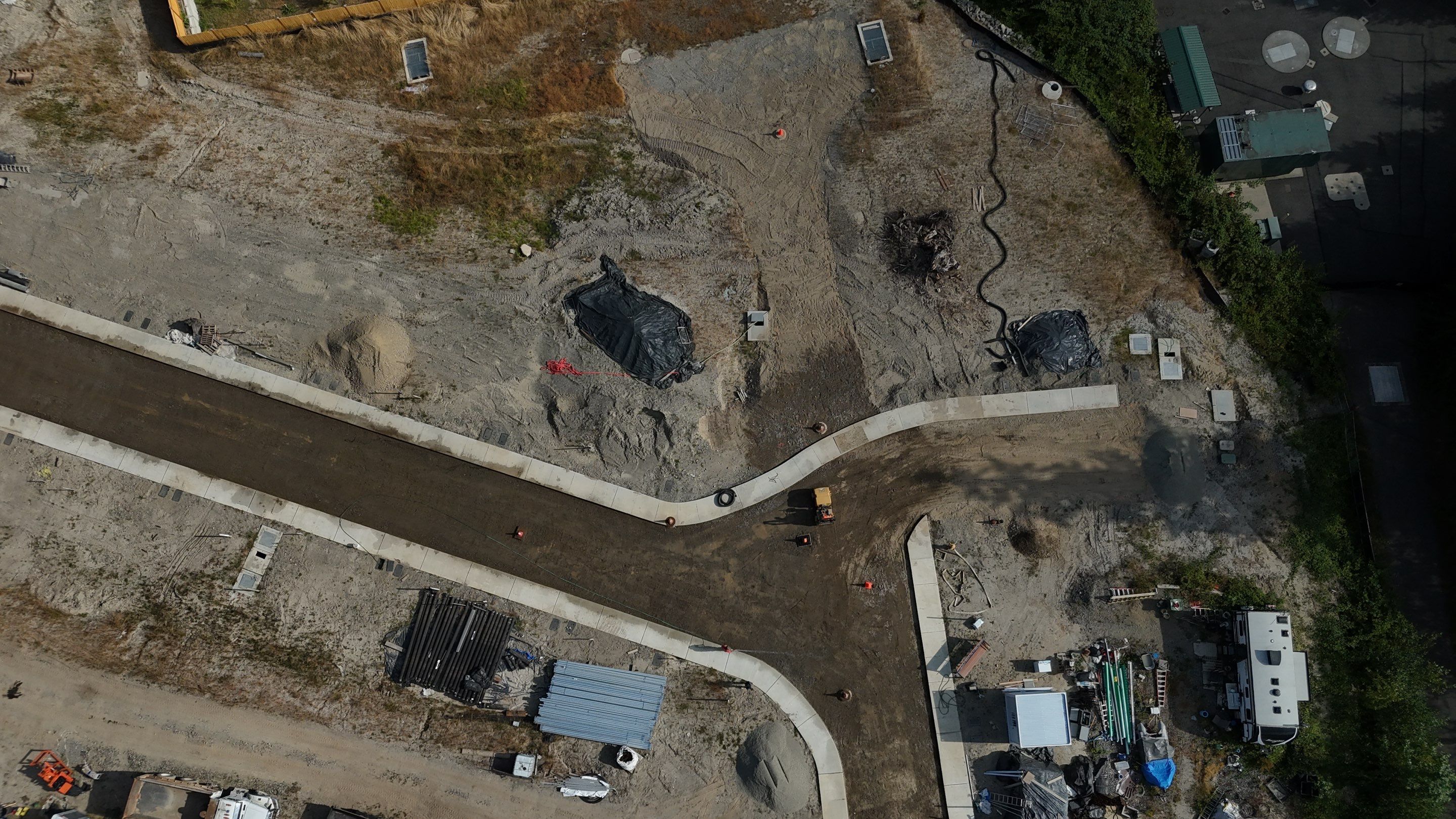 Asphalt Road Repair in Neighborhood  by Jireh Asphalt & Concrete Inc 