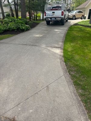 Concrete Driveway and Walkway Staining With Espresso Borders in Grand Rapids