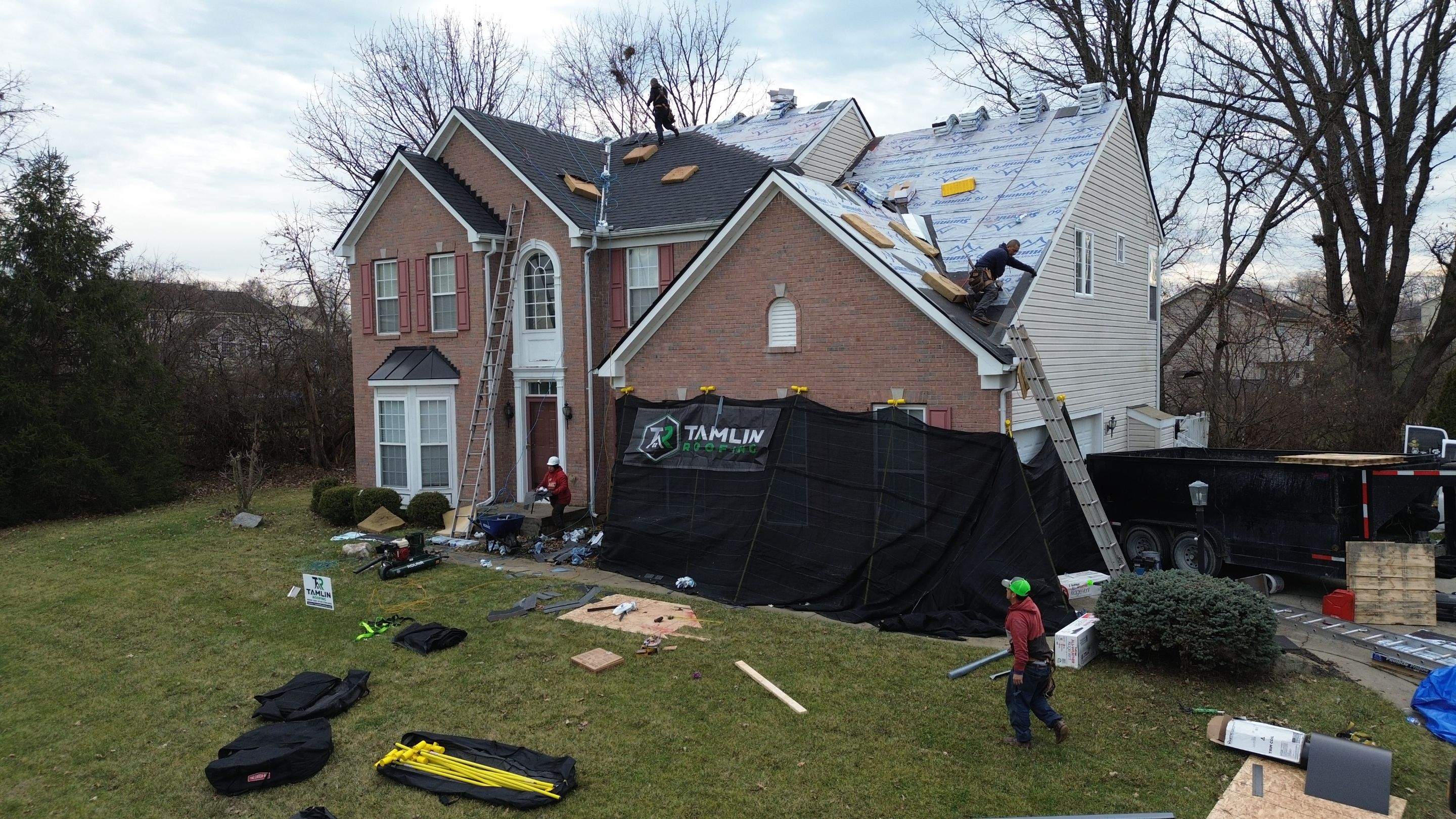 Walden Ponds - Pristine Black and Hydro Flo Gutter Guards by Tamlin Roofing