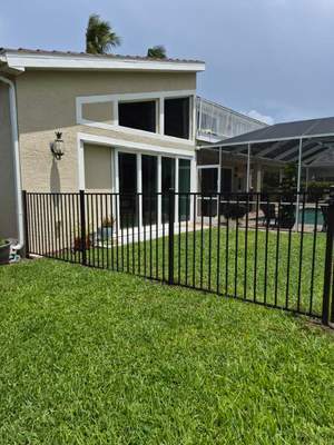 Bronze Aluminum Perimeter Fence Installation in Fort Myers