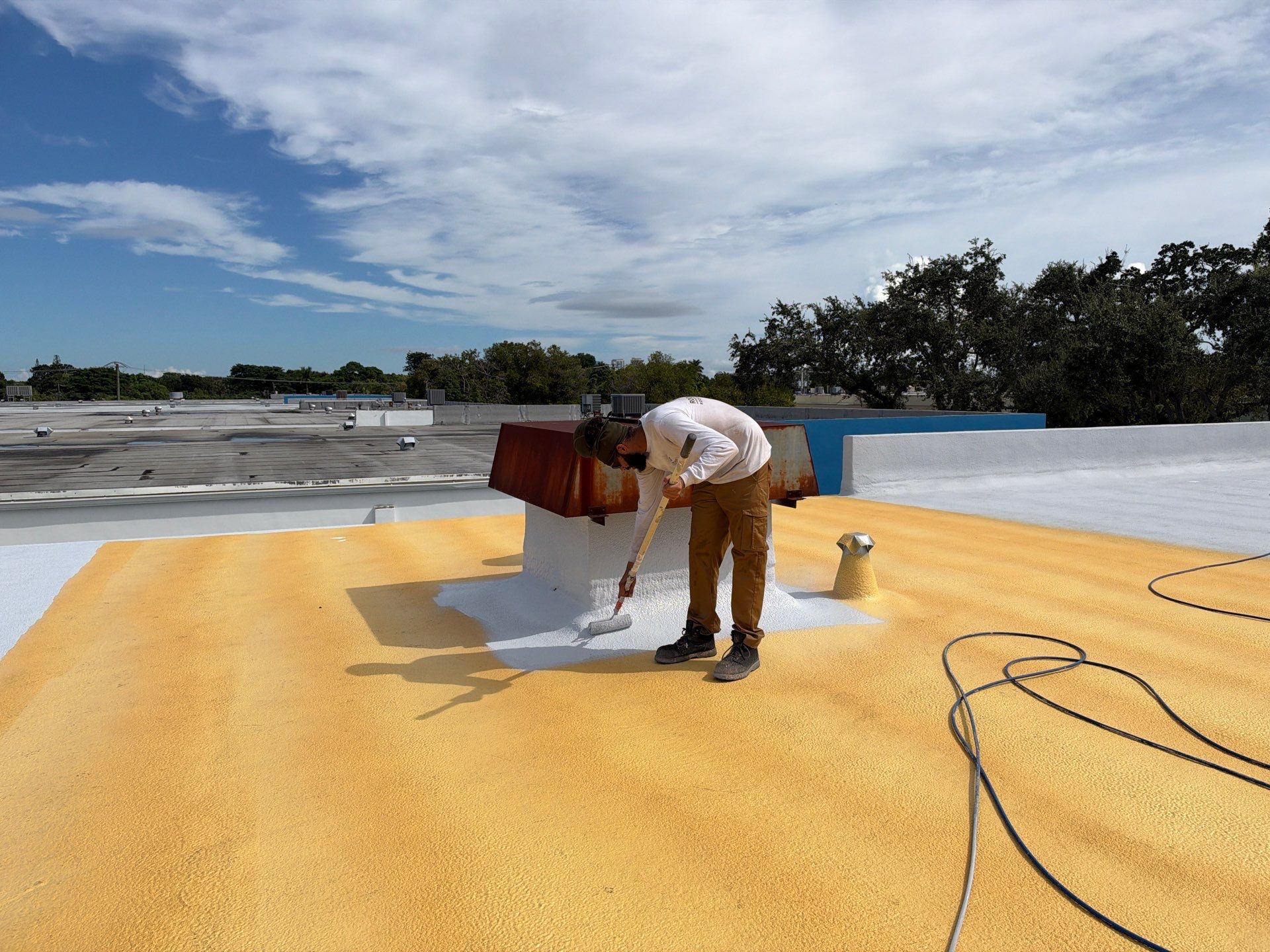 Fort Lauderdale Commercial Roof Restoration with Spray Foam and Silicone Coating by Roof King LLC