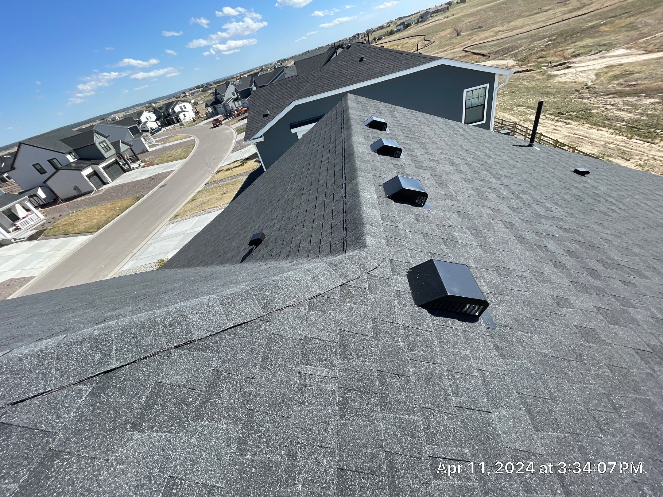 Residential Roofing Installation using Atlas Pinnacle Impact Black Shadow by Blue Peaks Roofing LLC 