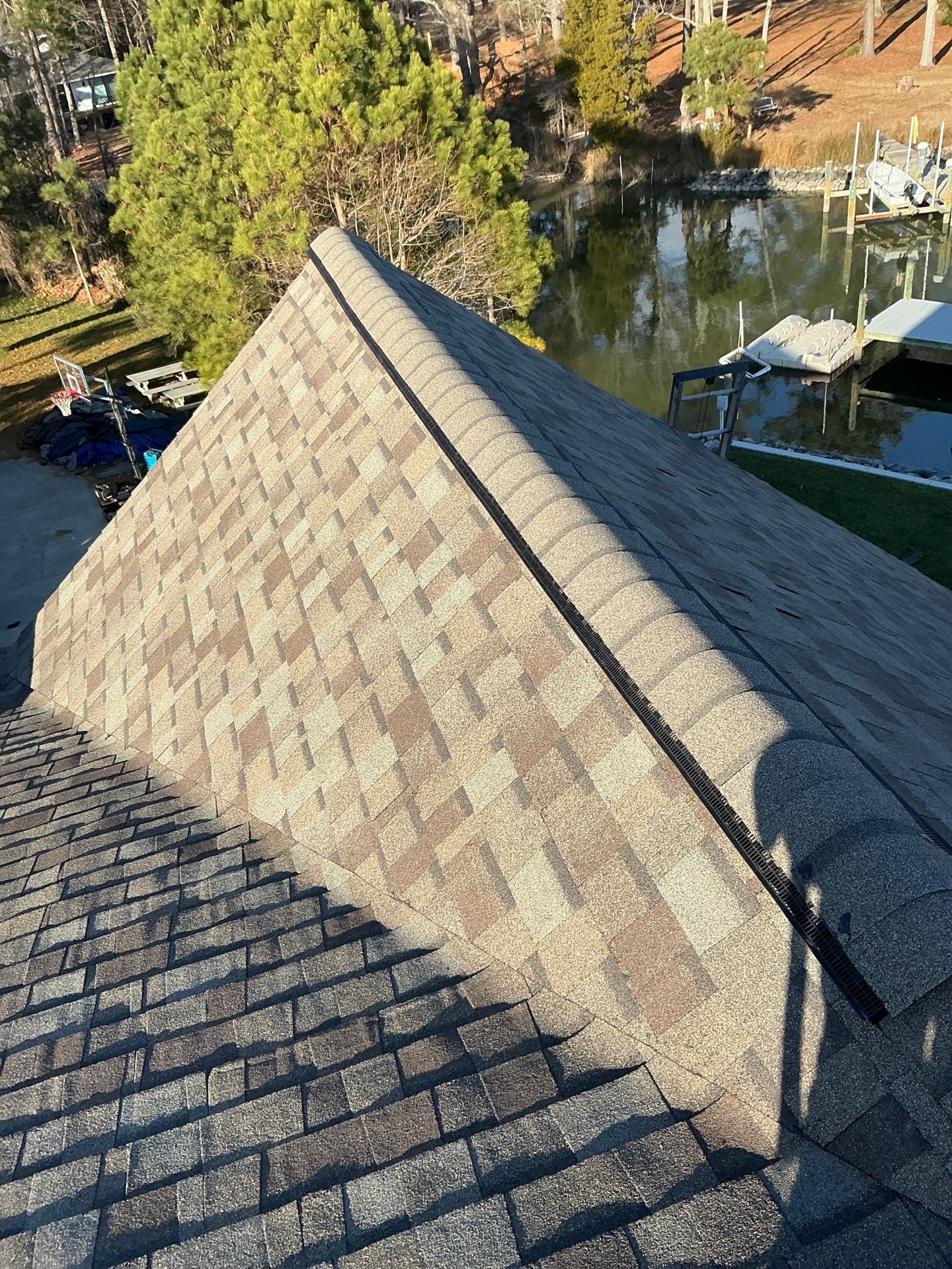 Waterfront Roof Replacement in White Stone, VA by Cade Construction