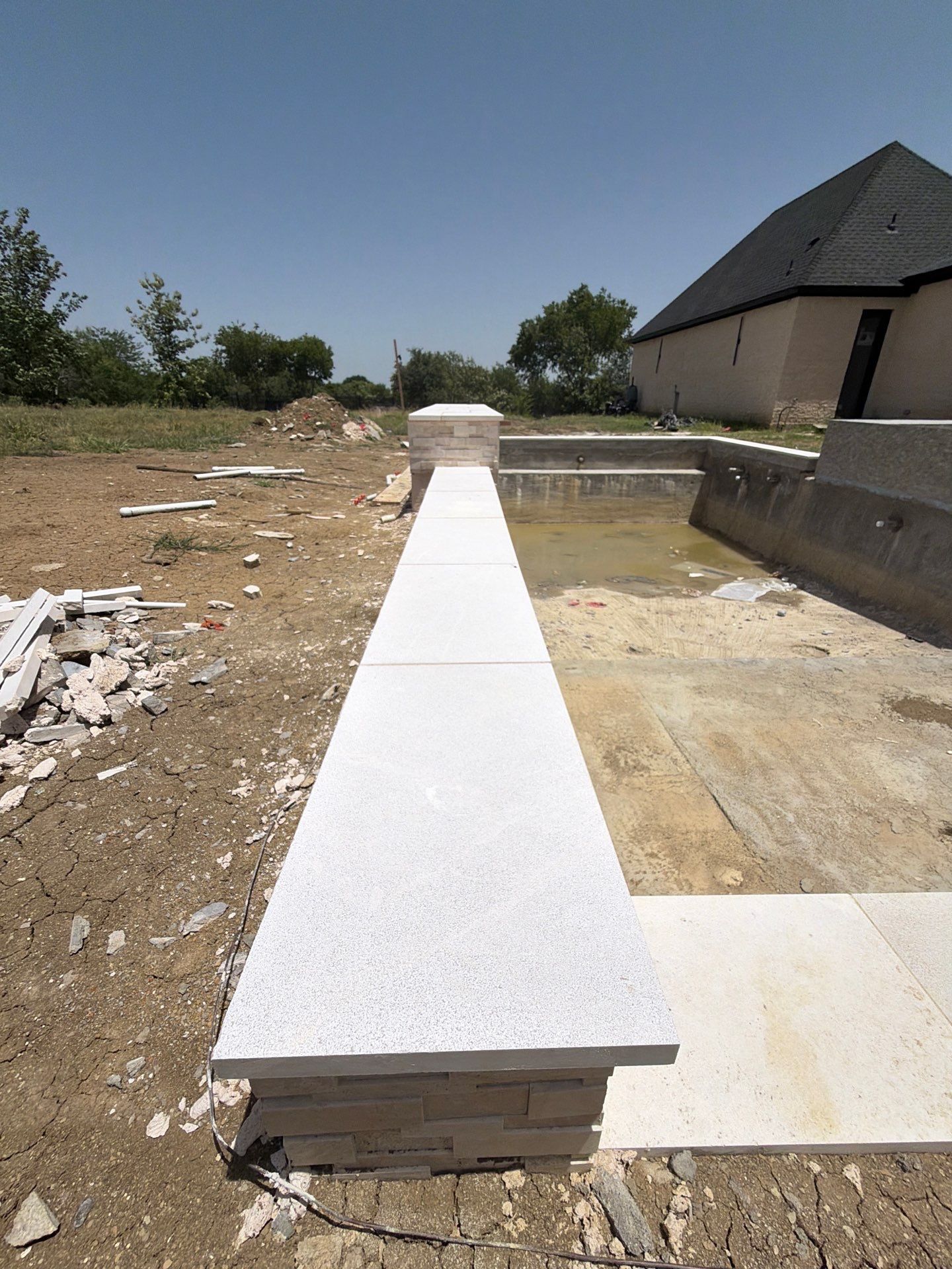 Modern Geometric Pool with Raised Spa and Tanning Ledge by Pinnacle Pools and Spas - DFW