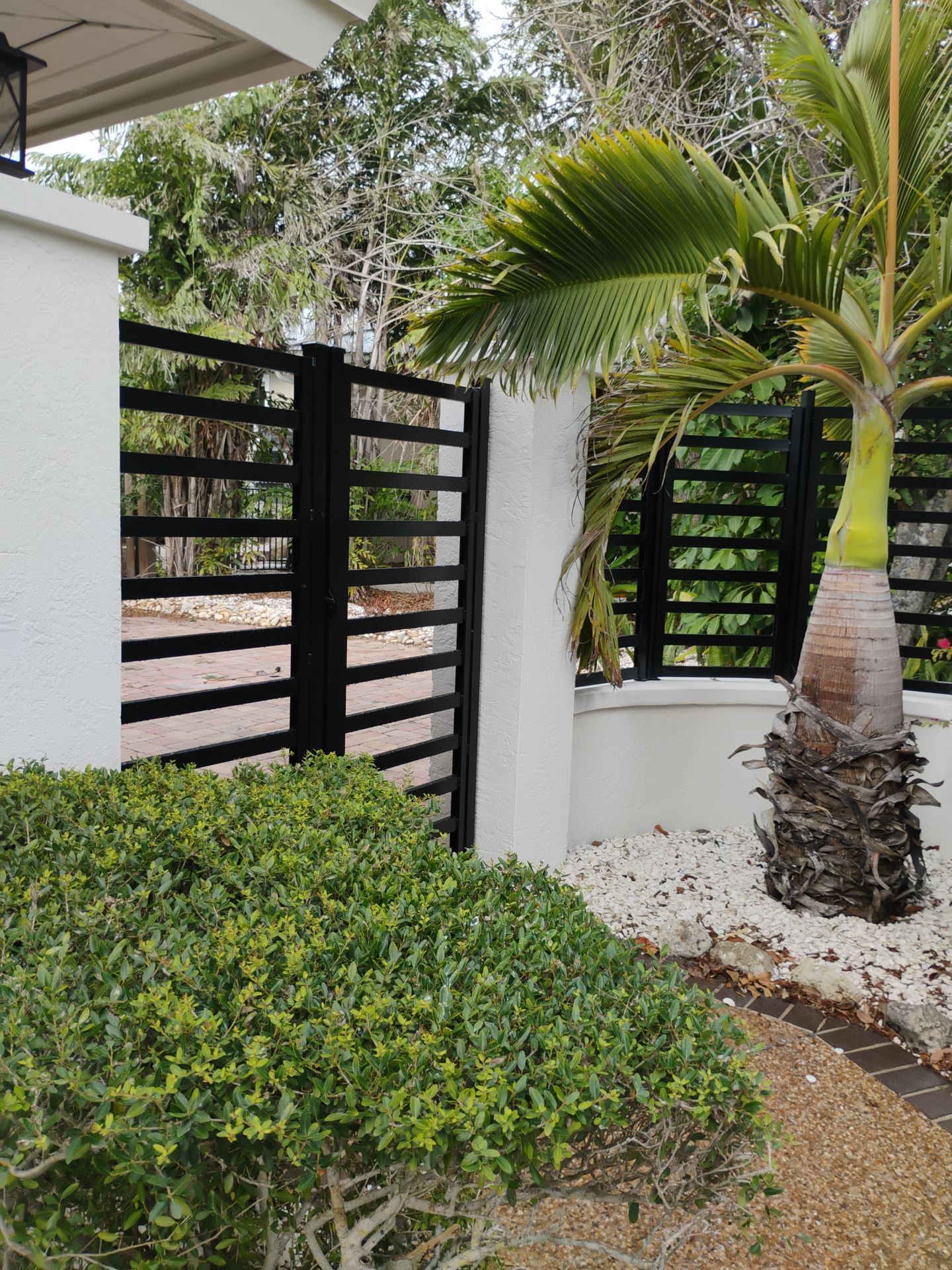 Custom Aluminum Horizontal Slat Fencing and Decorative Gates in Siesta Key by True Fence LLC