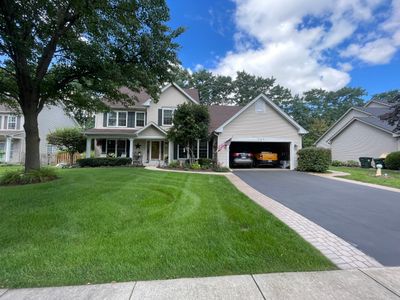 Turtle Shell gutter protection installation in Oswego, IL 60543, photograph 2