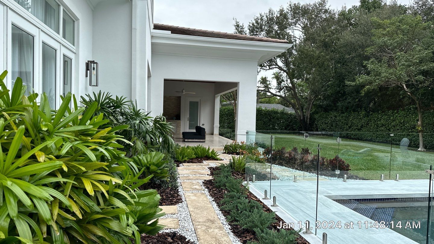 Backyard Landscape Renovation by Nature's Dream Landscape and Tree Service