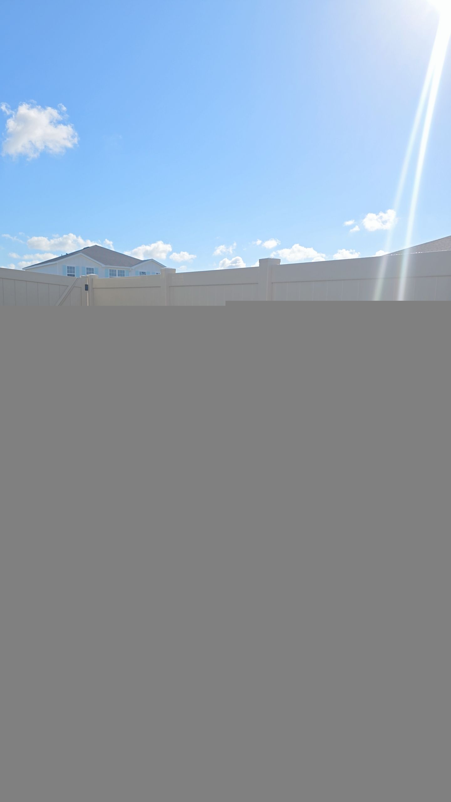 Tan Vinyl Fence in West Port by True Fence LLC