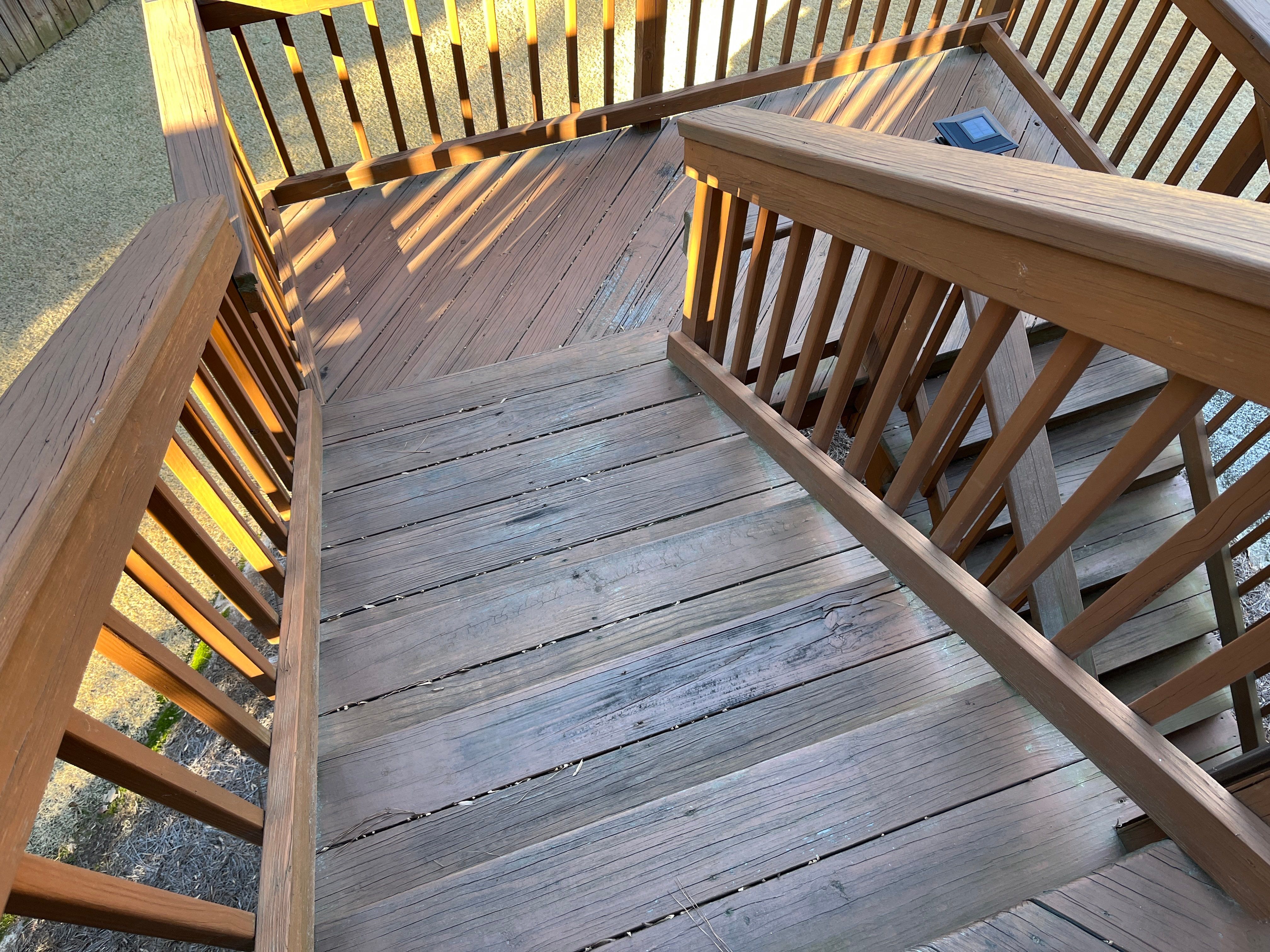 Deck and Fence Stain with Deck Board Repairs in Atlanta, GA by Nelson Exteriors 