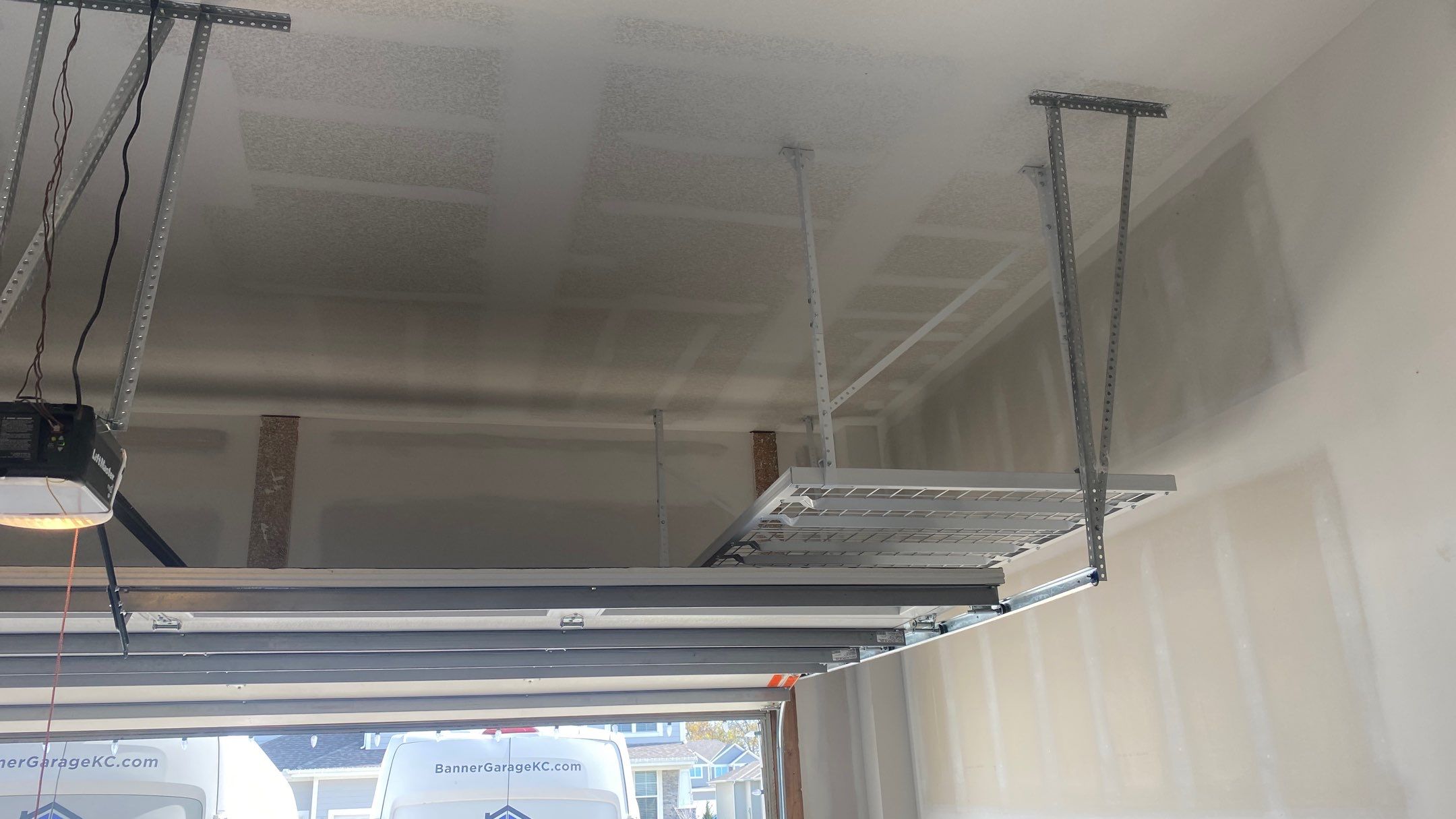 Stan D. adds ceiling rack to garage!  by Banner Garage