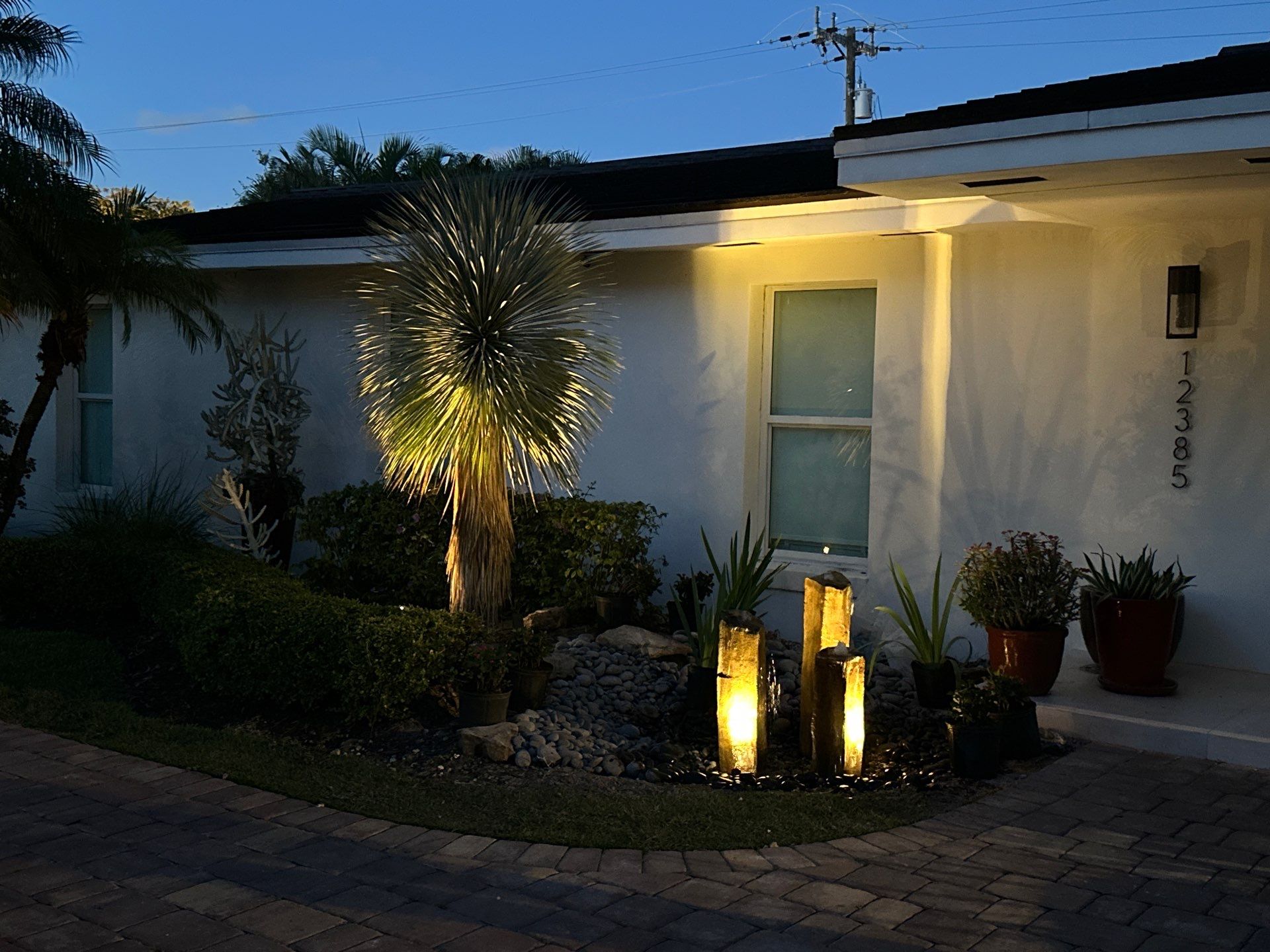 Pinecrest Fountain at Door Entrance by Nature's Dream Landscape and Tree Service
