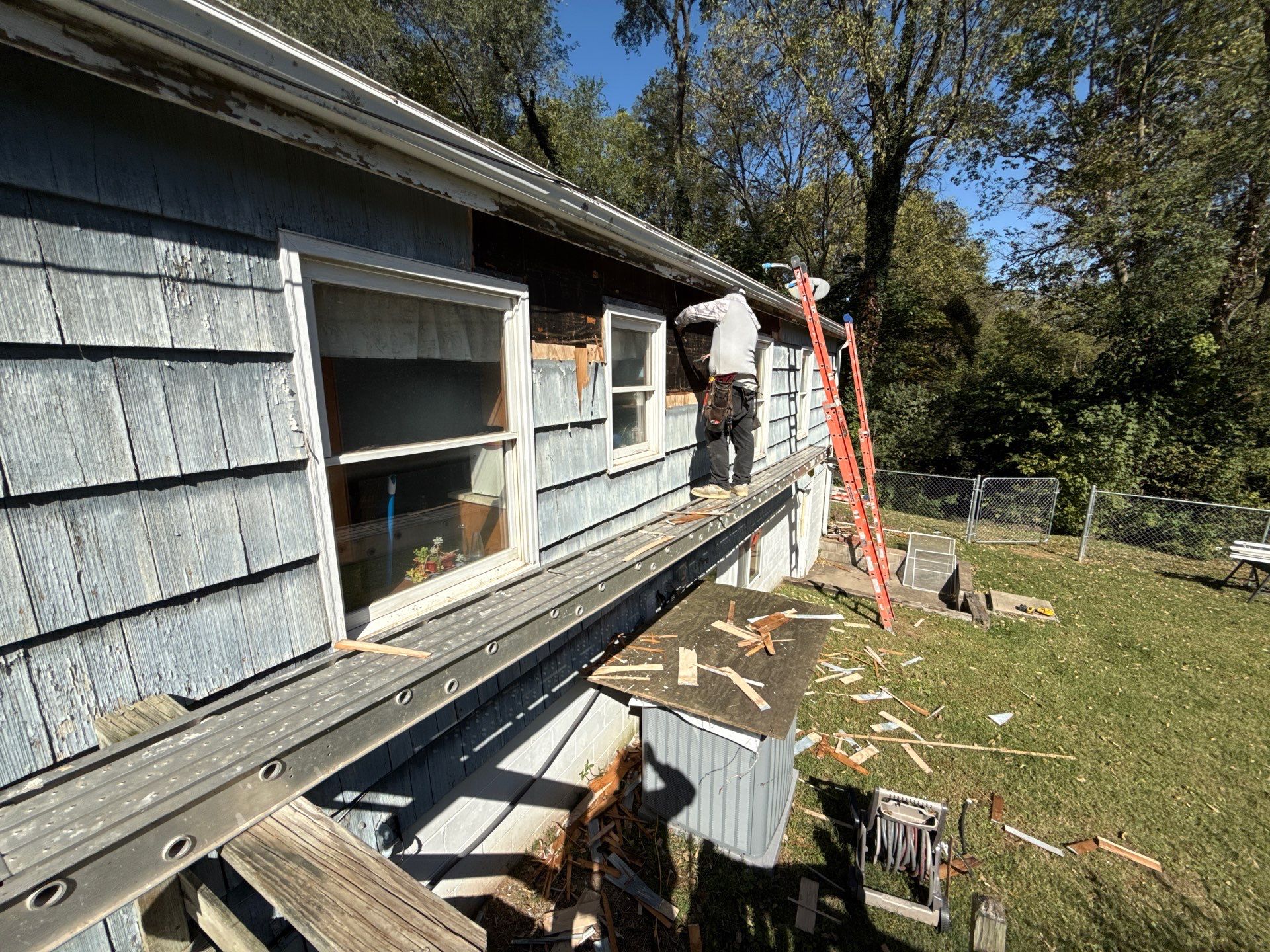 Feeling Blue in Weston Mo - Time for a Makeover by EEC Windows, Siding & Roofing