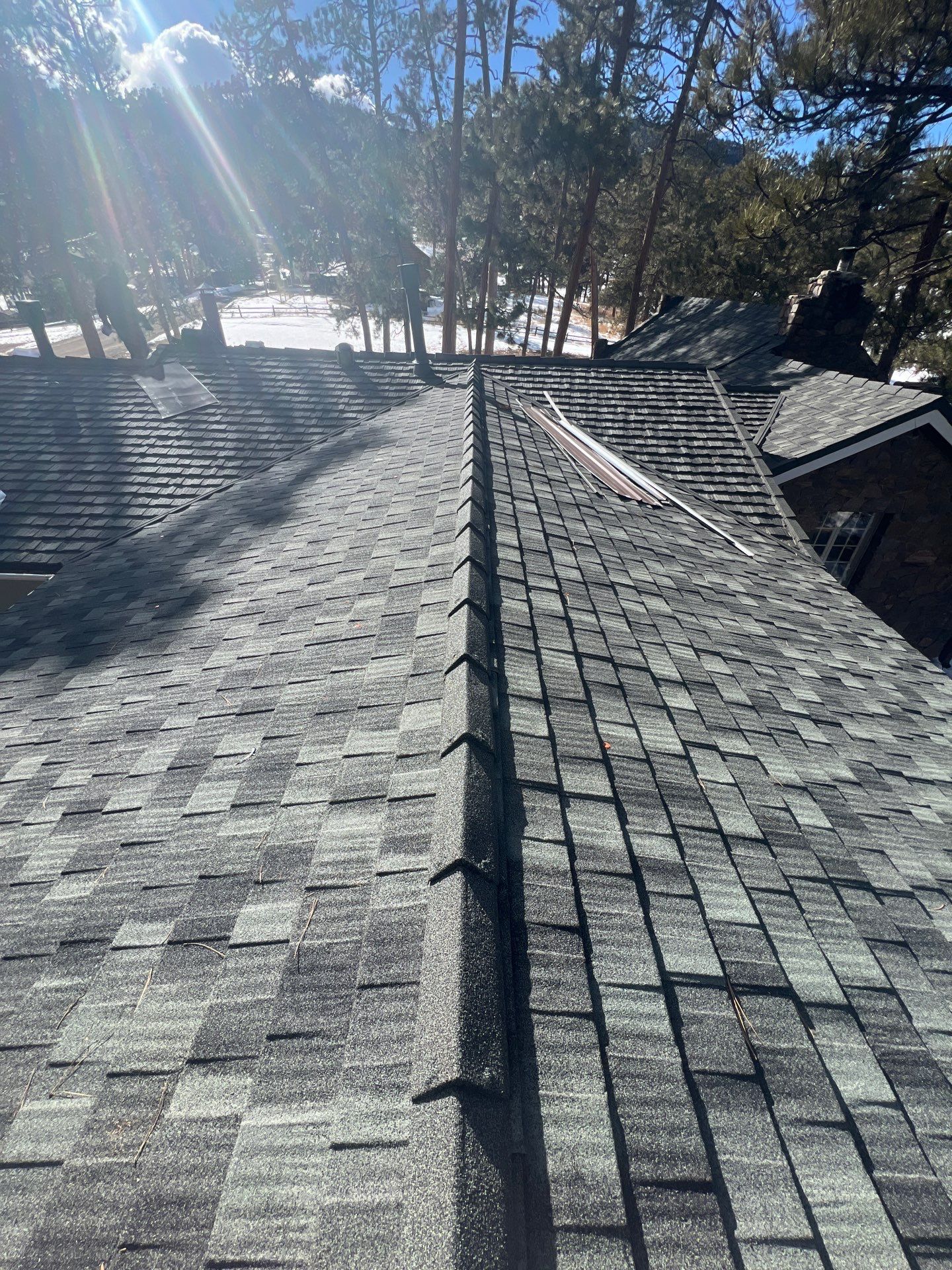 Residential Roofing Installation using Stone Coated Steel by Blue Peaks Roofing LLC 