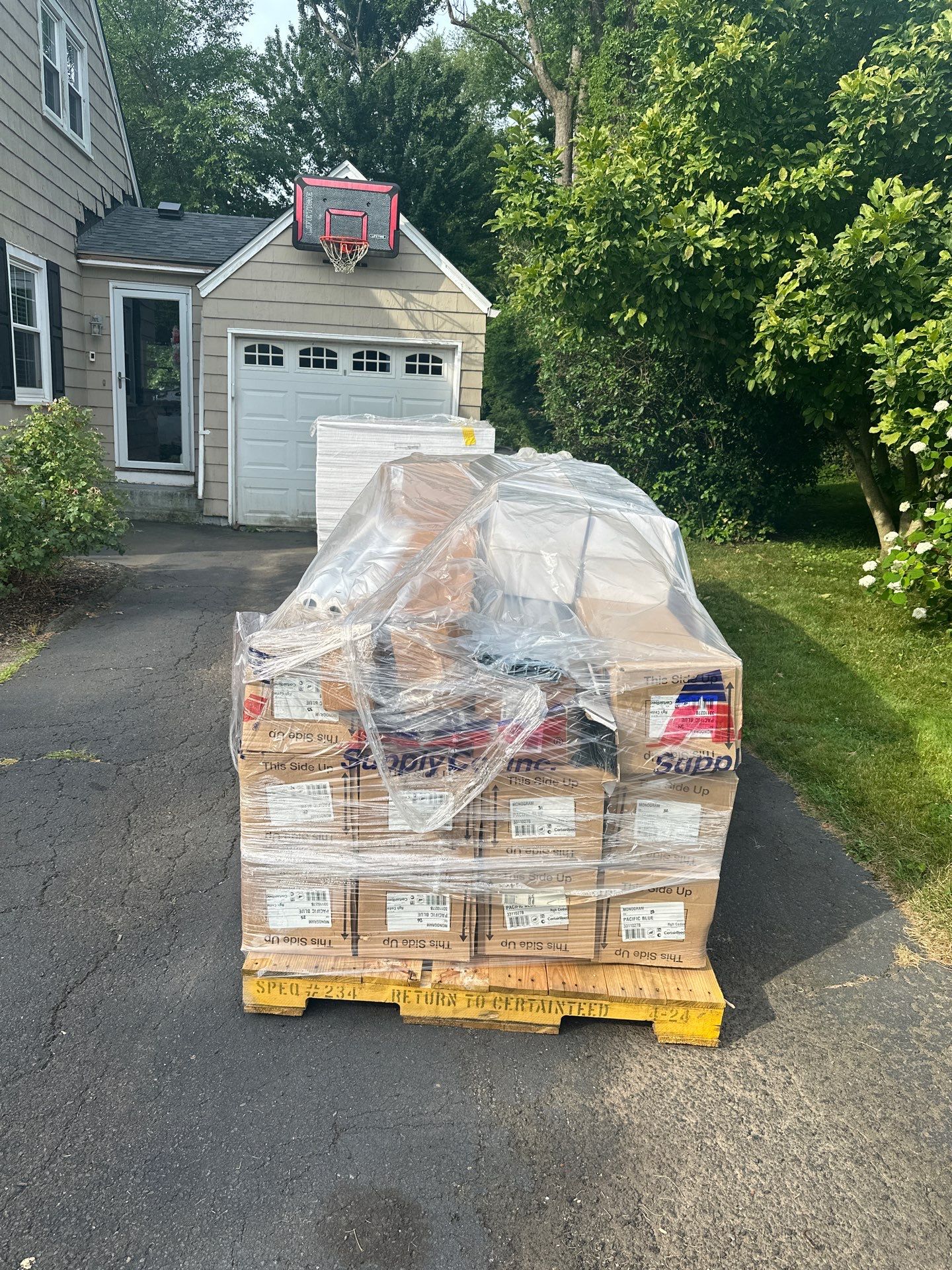 Complete Exterior Estate gray with Pacific Blue Siding by A Plus Exterior