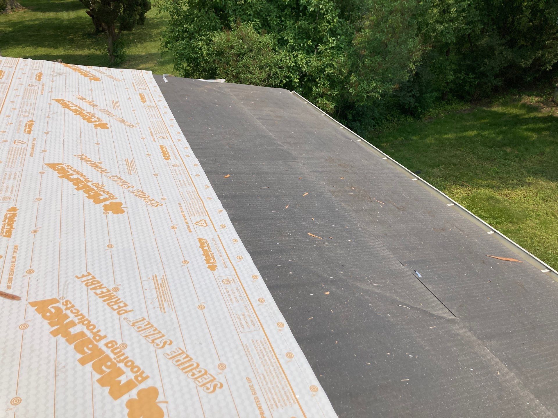 Roof replacement Malarkey Legacy shingles color Sienna Blend by Pro Home Services Inc