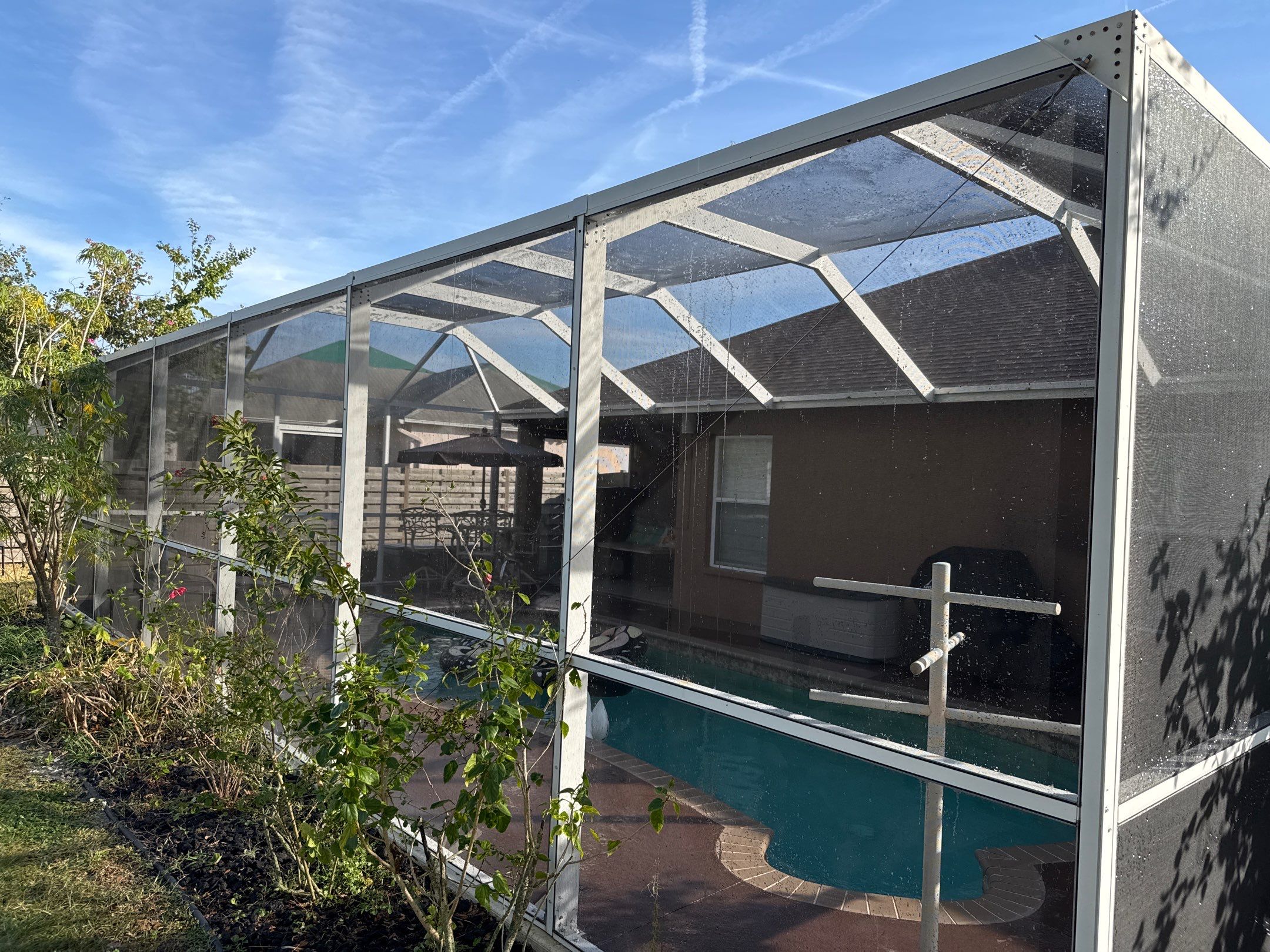 Driveway, Sidewalk, Street Curbing & Pool Screen Enclosure Cleaning in Regency Oaks, Palmetto, FL | Sunshine AquaWash by Sunshine AquaWash
