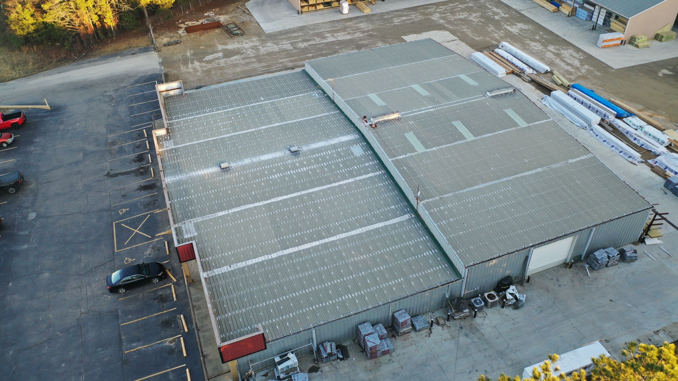 Commercial Roofing Installation using Aldocoat Coatings by Hostetler Roofing