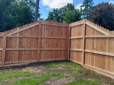 Custom Cedar Unstained Wood Privacy Fence Installation in Cedar Falls