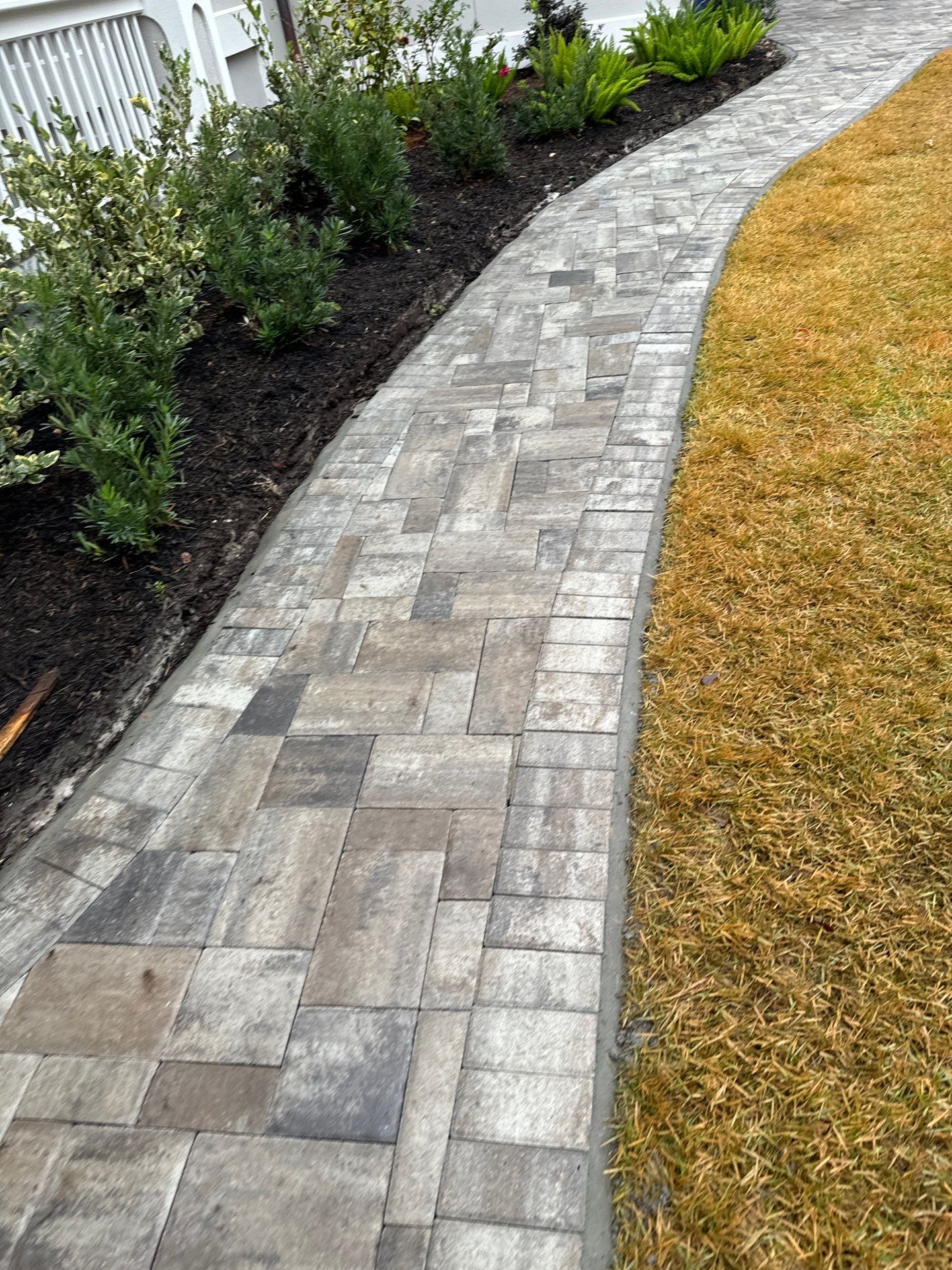 Custom Paver Driveway and Textured Pool Deck Installation in Hilton Head Island by Lowcountry Scapes, LLC