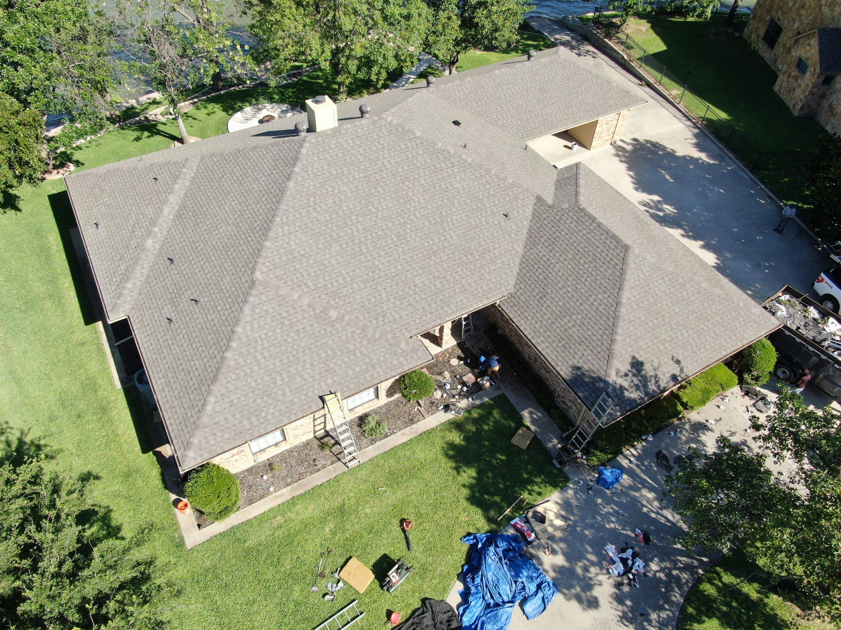 Full Architectural Shingle Roof Replacement and Chimney Repair in Runaway Bay by Armor Roofing | Exteriors