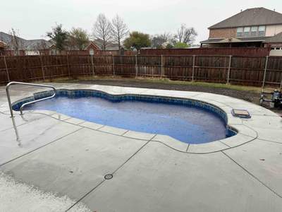 Freeform Pool with Raised Spa and Blue Tile