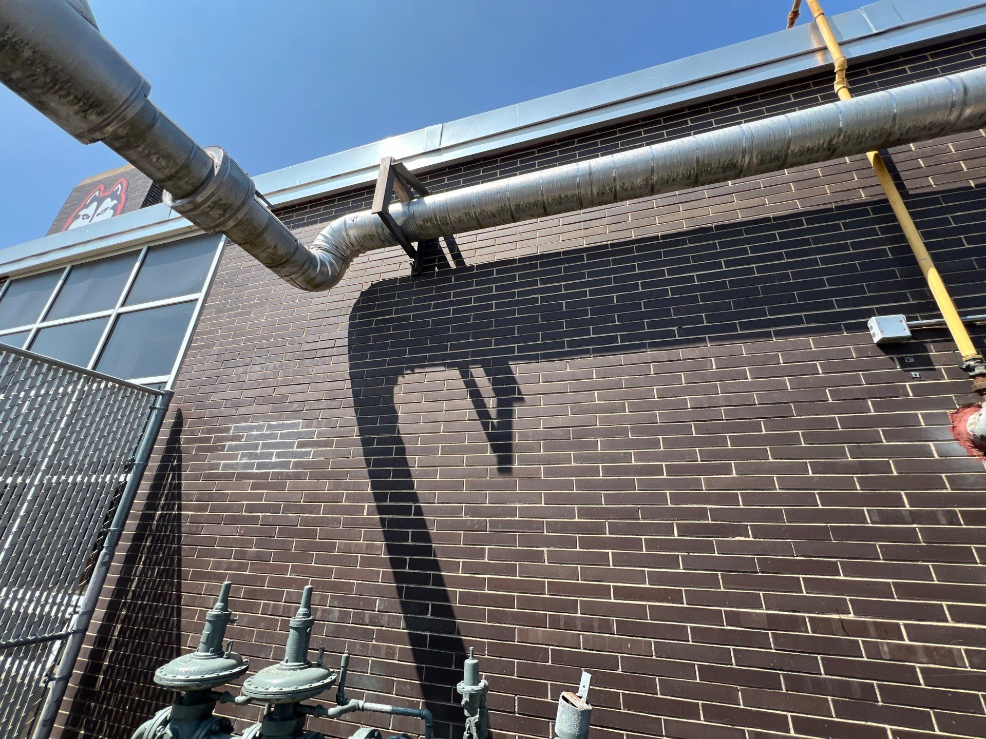 commercial pressure washing using Algaecide, soft wash soap by Northern Power Washing LLC.