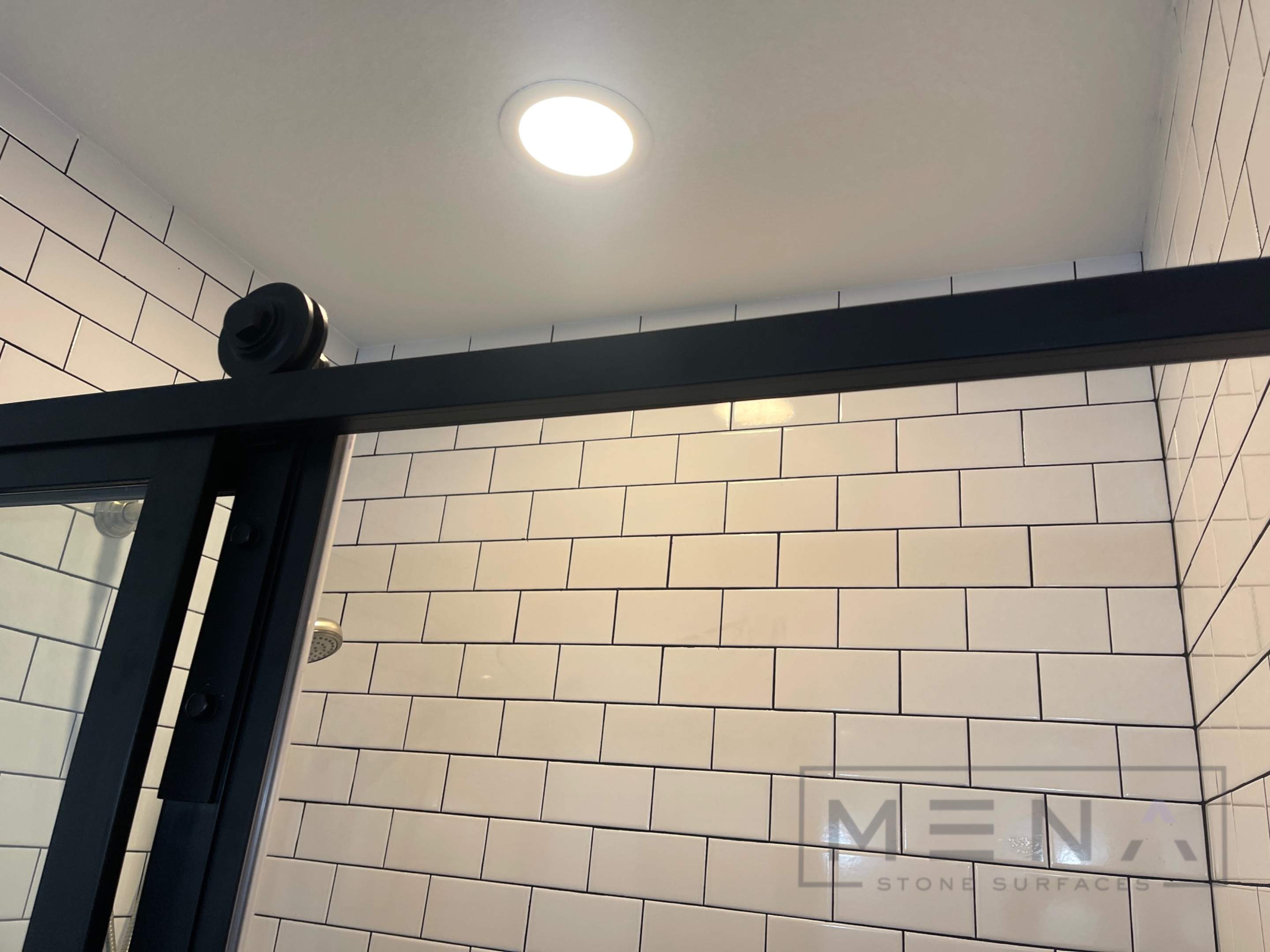 Batrhoom remodel using Custom Cabinets by Mena stone surfaces