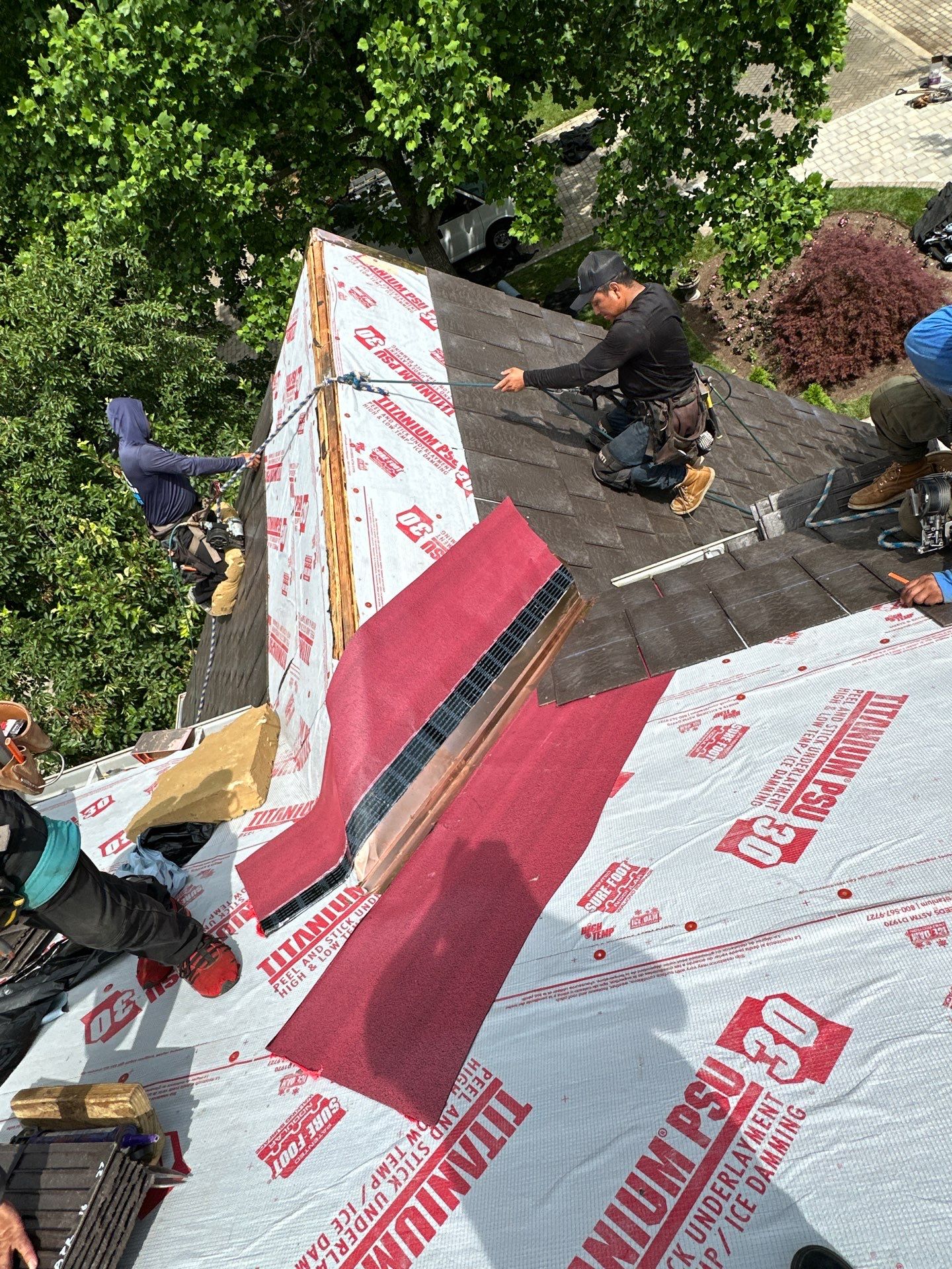 Residential Roofing Installation Using Enviroshake Synthetic Slate by Undersun Roofing 