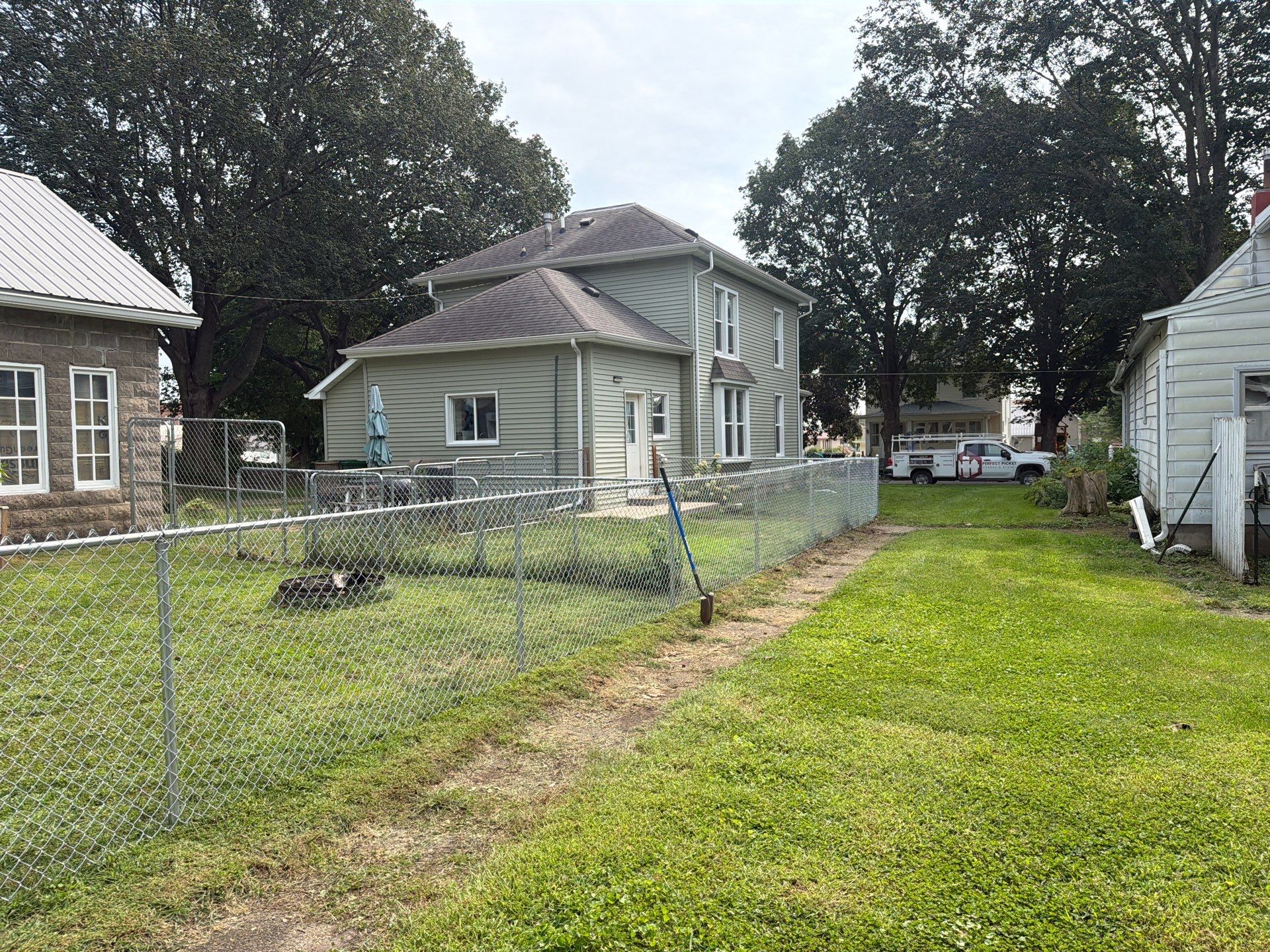 Galvanized Chain Link Fence and Gate Installation in La Porte City by Perfect Picket Fence and Stain