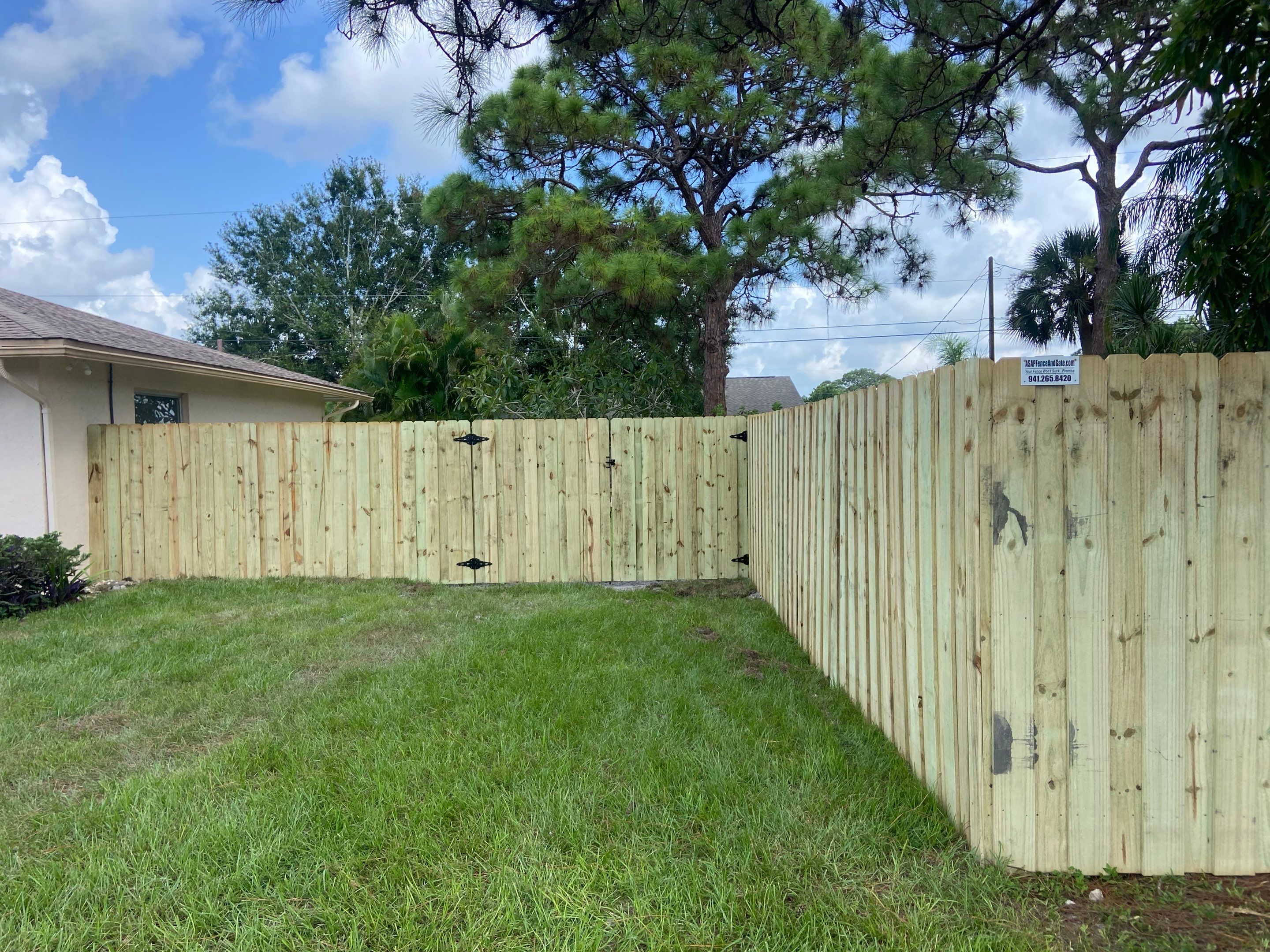 Wood Fence Installation using Board on Board Wood Fence by Asap fence and gates, LLC