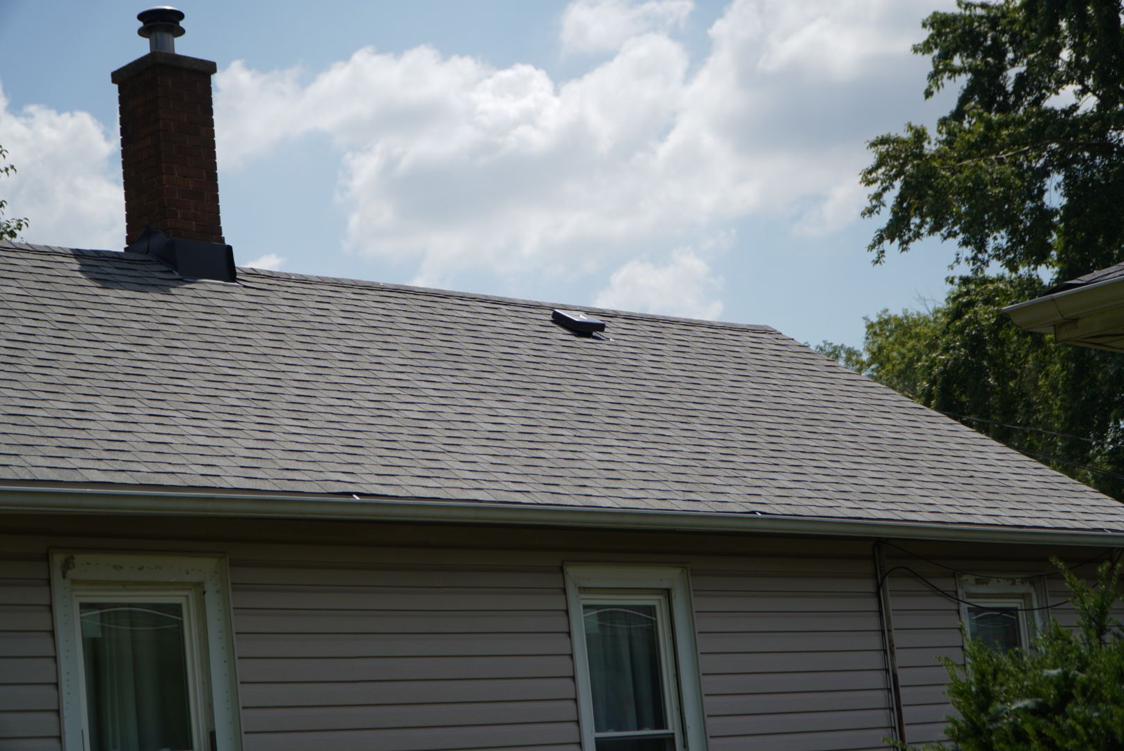 Roof replacement by hail damage using Cobblestone Gray by Just Brilliant Restoration JBR