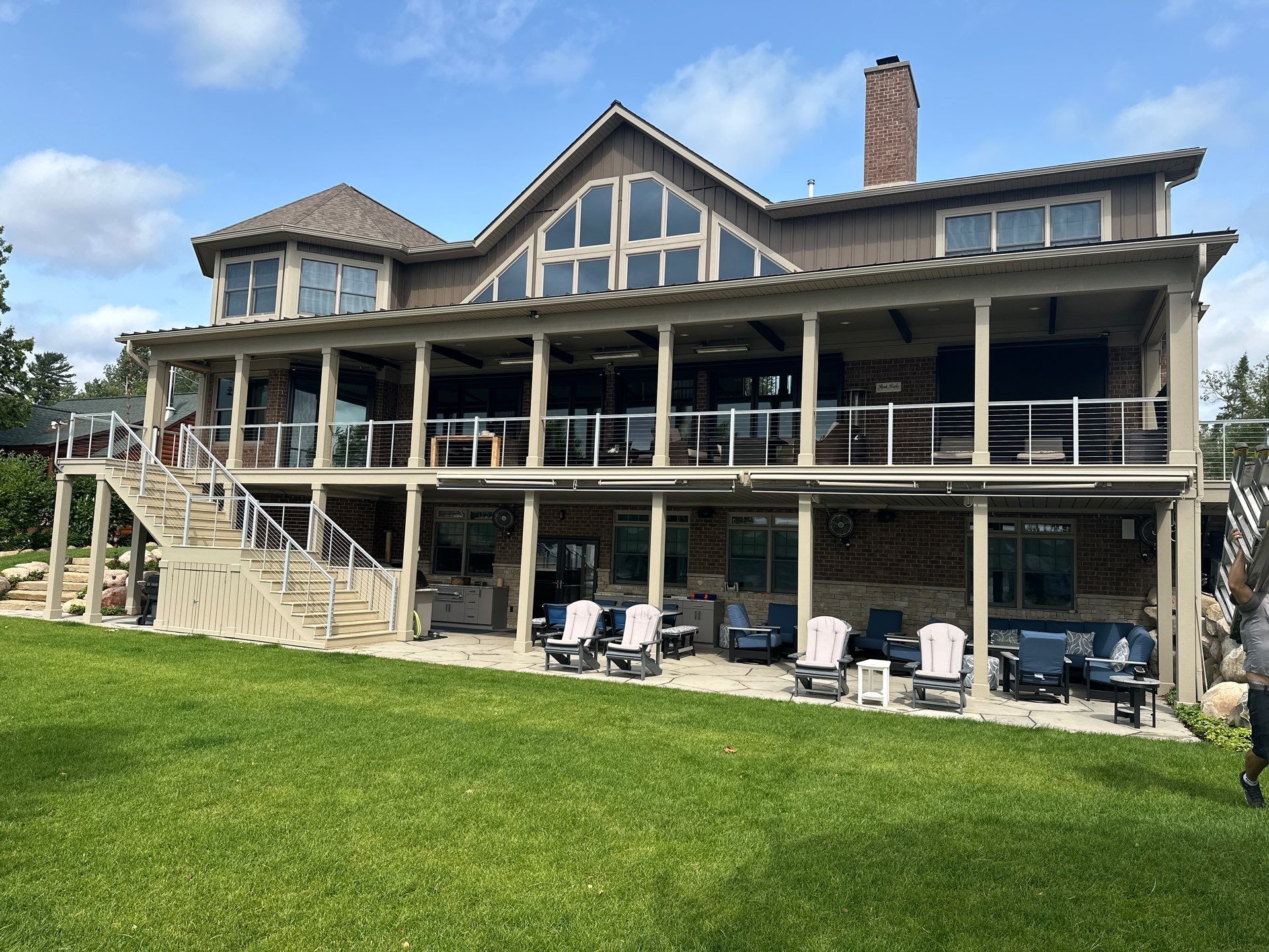 Custom Underdecking System and Outdoor Kitchen in East Jordan by Rainbow Seamless Systems