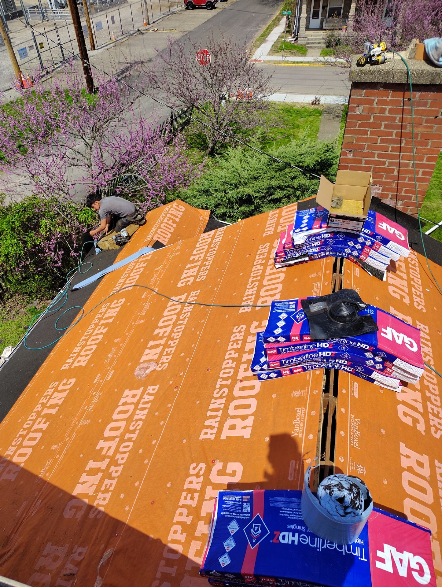 Residential Roofing Installation using GAF Timberline HDZ Charcoal by Rainstoppers Roofing