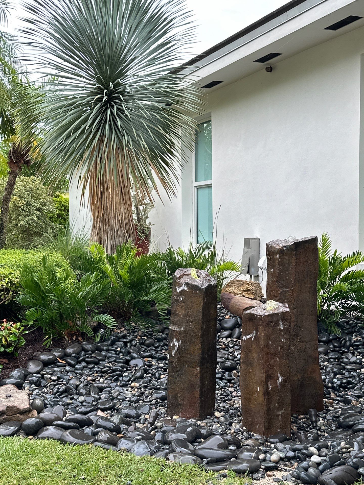 Pinecrest Fountain at Door Entrance by Nature's Dream Landscape and Tree Service