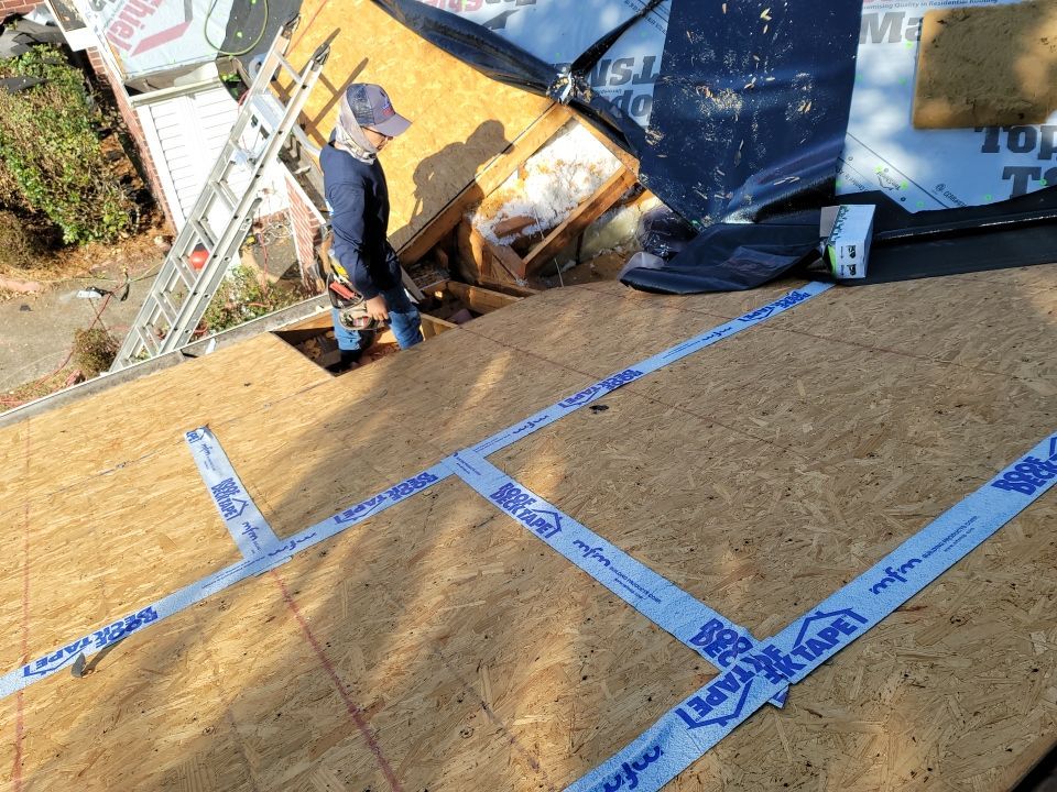 Residential Roofing Installation using Roof Replacement by American Roofing & Construction LLC