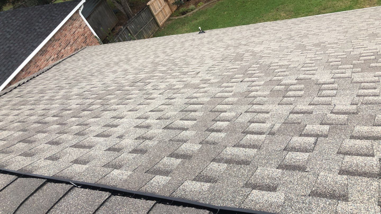 Residential Roofing Installation using Roof Replacement by American Roofing & Construction LLC