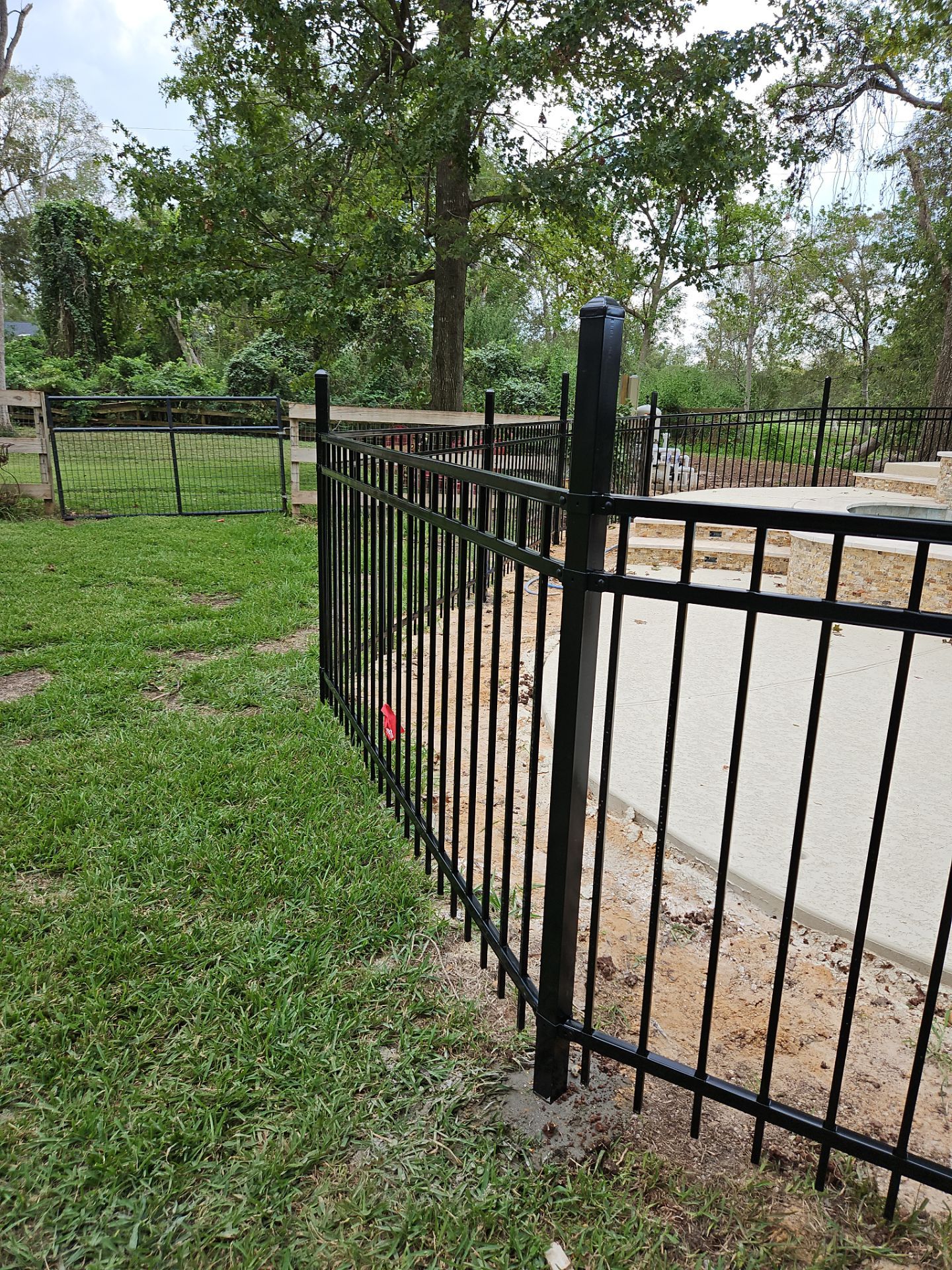 Ranch Style fence Plus Iron installation by Tim's Fences