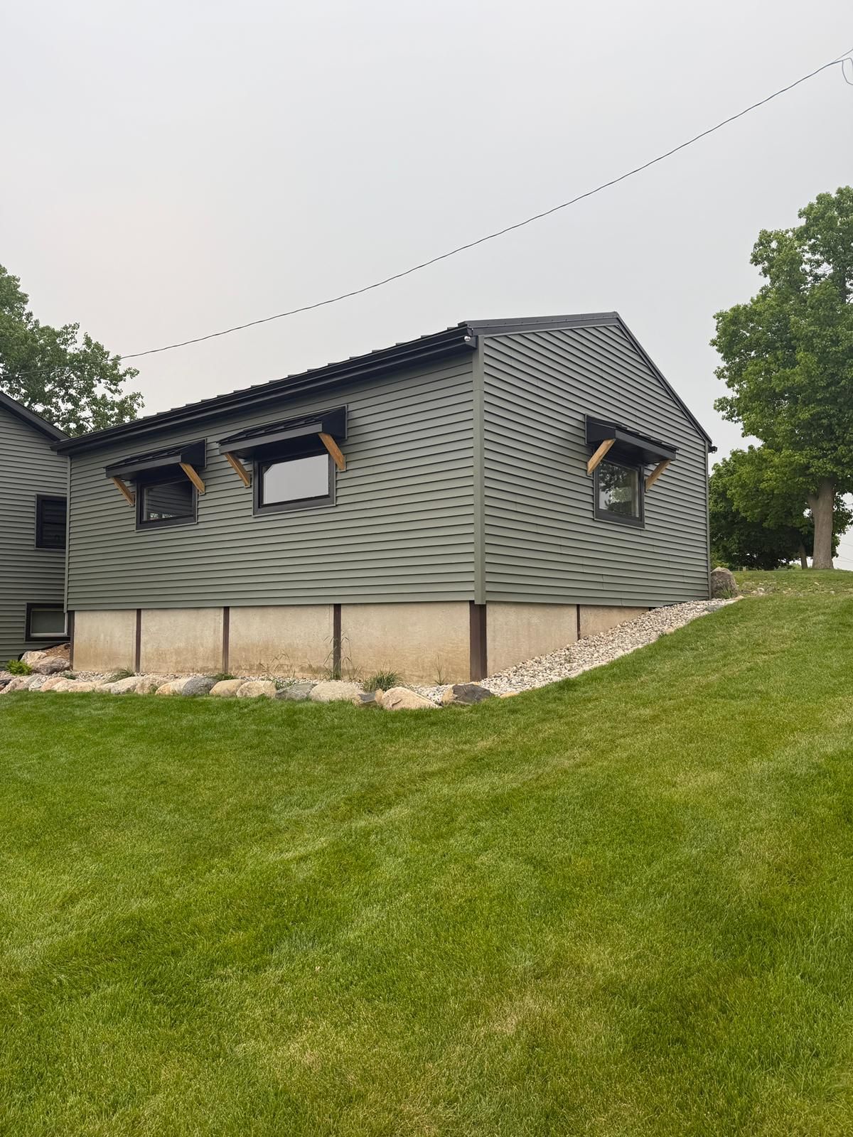 ROOF, SIDING AND SOFFIT INSTALLATION by Avalon Roofing and Exteriors