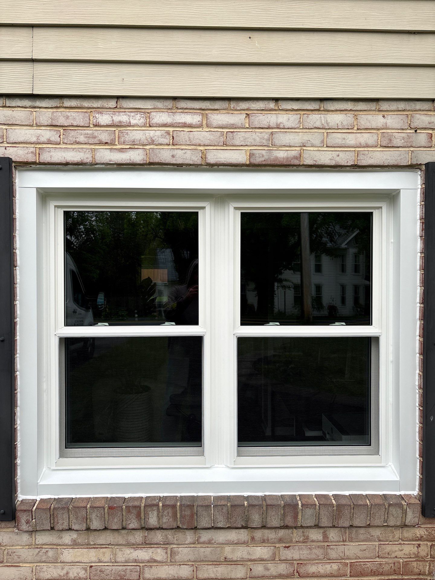 Double Hund Windows and Bow by Aspen Home Improvements