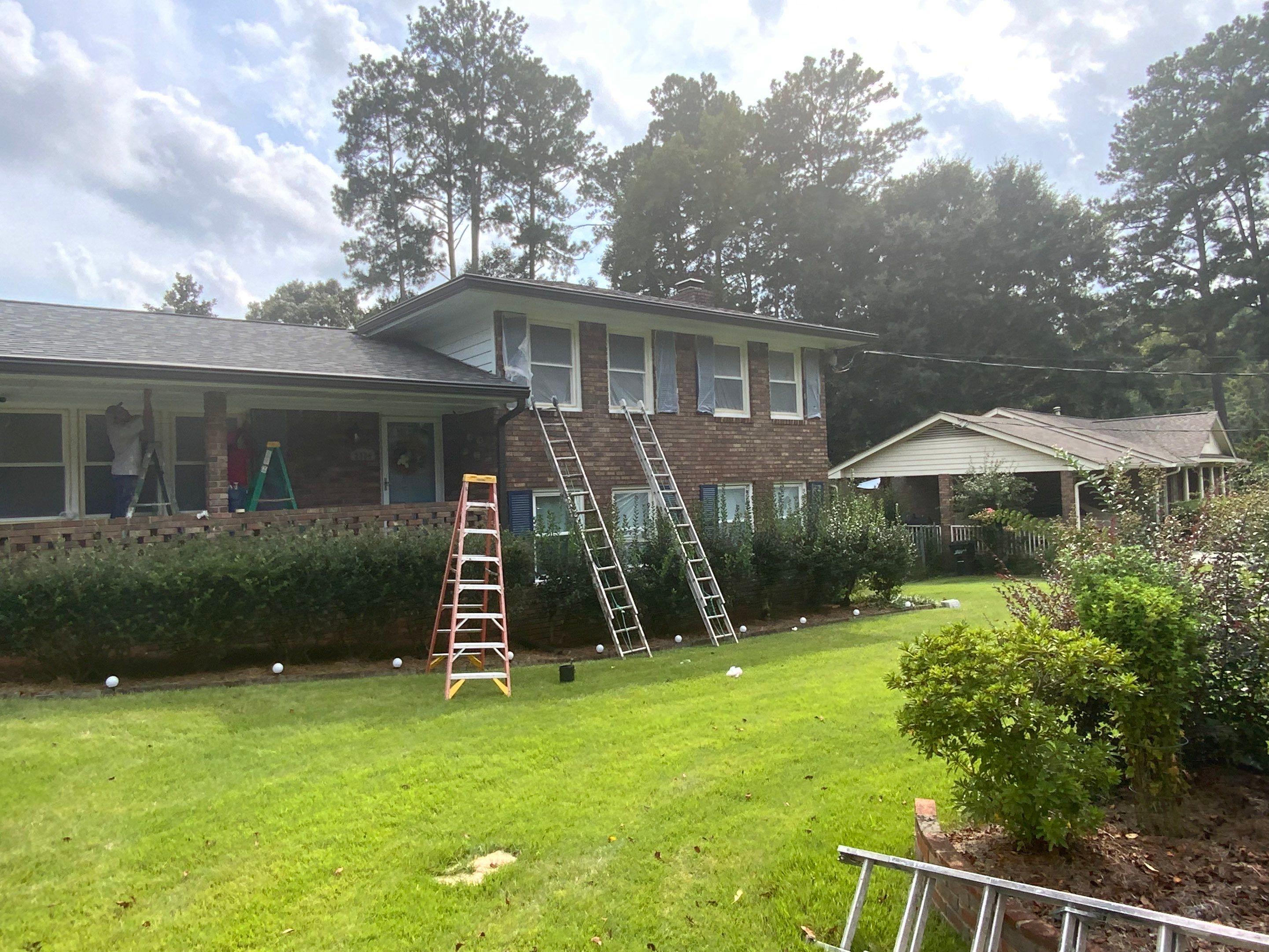 Full Exterior Trim Painting and Multi-Level Deck Staining by Swift Home Renovations