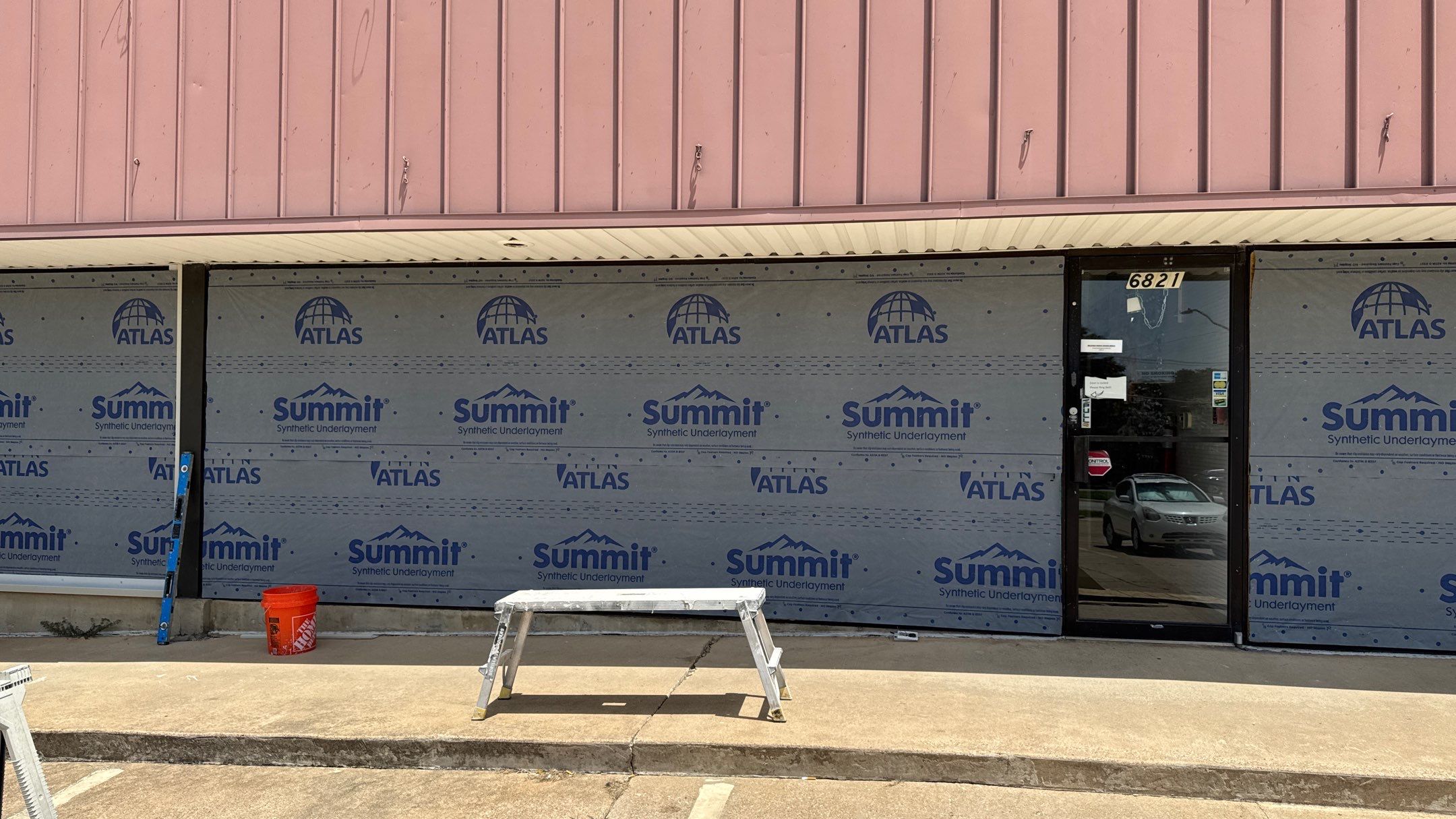 Commercial Building using Various Exterior Products by Harvey Roofing & Construction