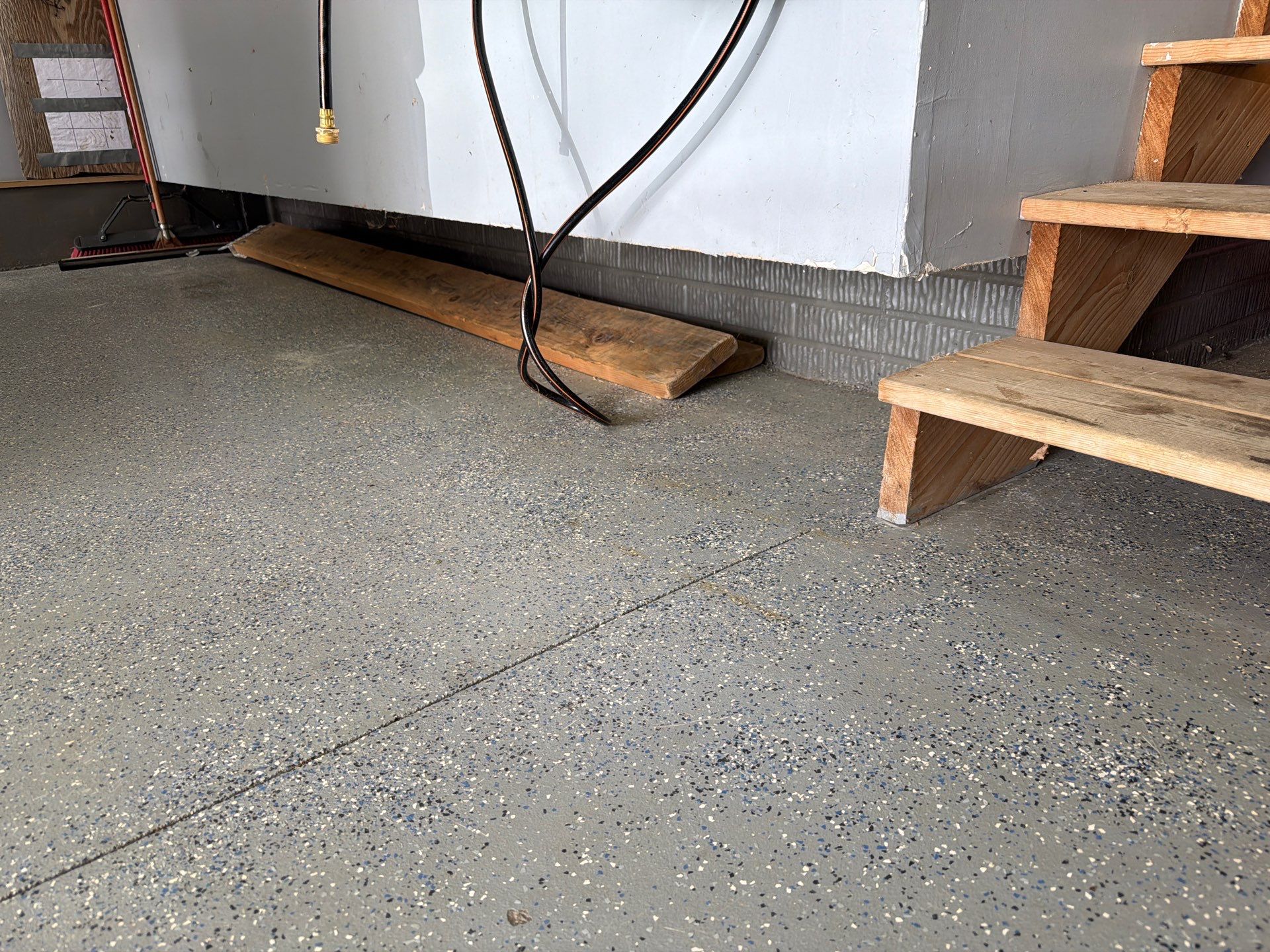Residential Garage Floor Coating in Sioux Falls by Select Painting, Coatings & Garage Cabinets