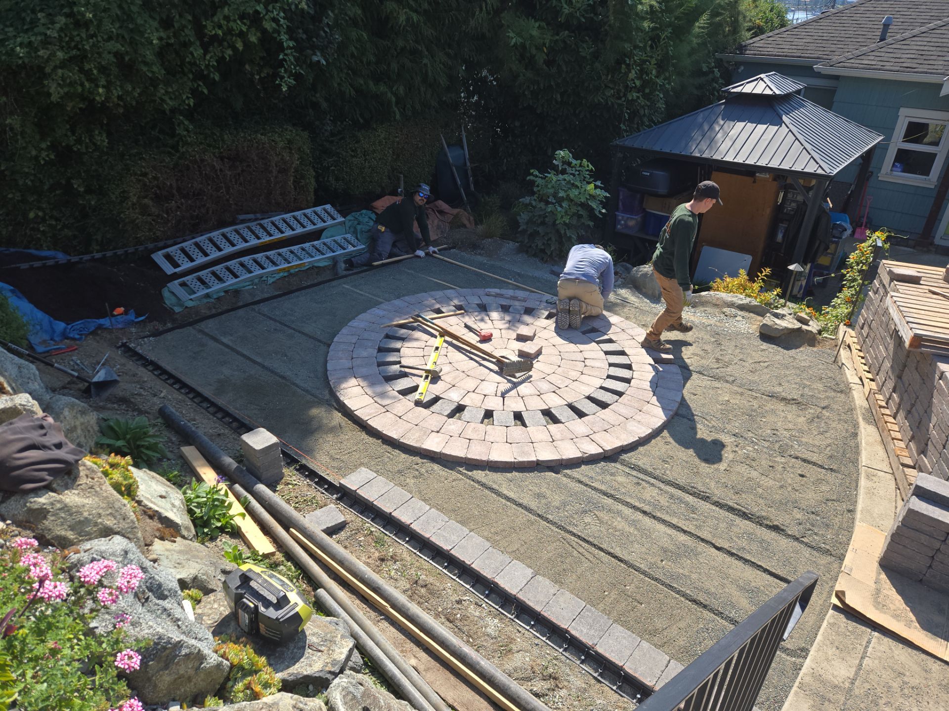 Backyard Transformation — Custom Shed, Paver Patio & Retaining Wall by Habanero Garden and Exterior Care