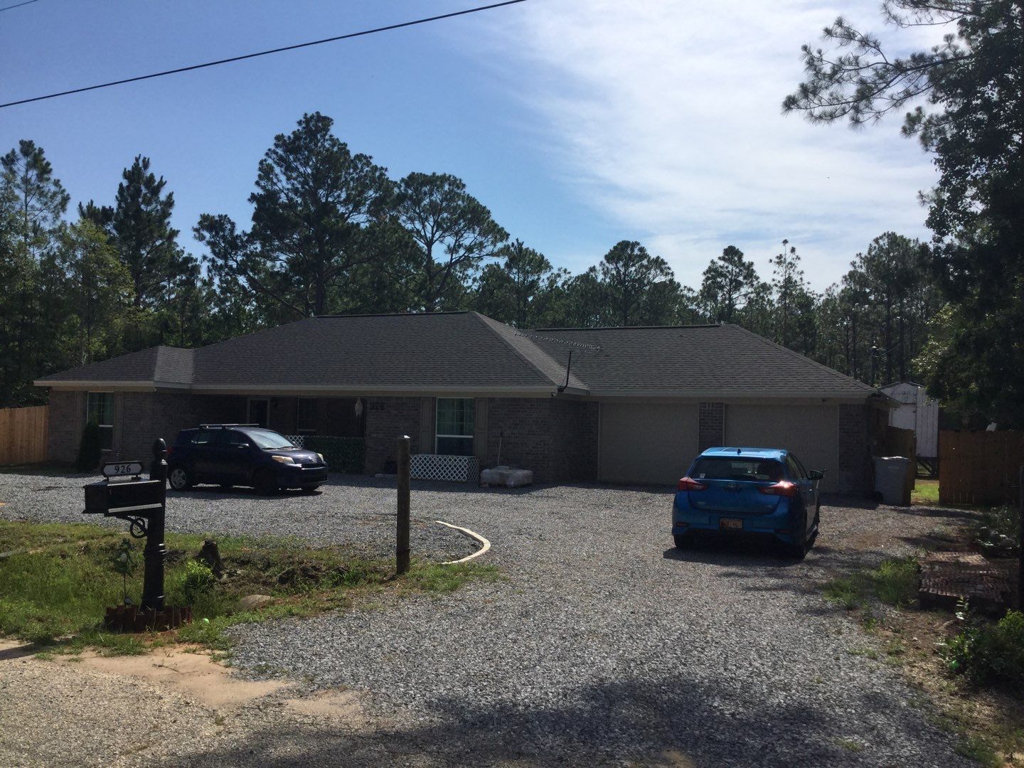 Downspout Installation using White Down Spouts in Milton FL by Gutter Professors
