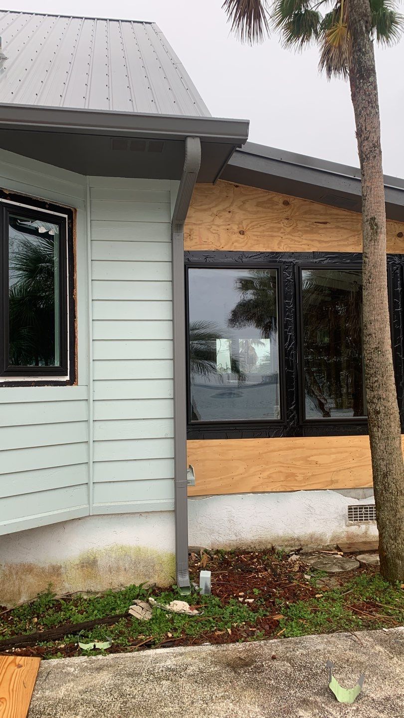 Seamless Gutter Installation using Charcoal Grey Gutters by Gutter Professors