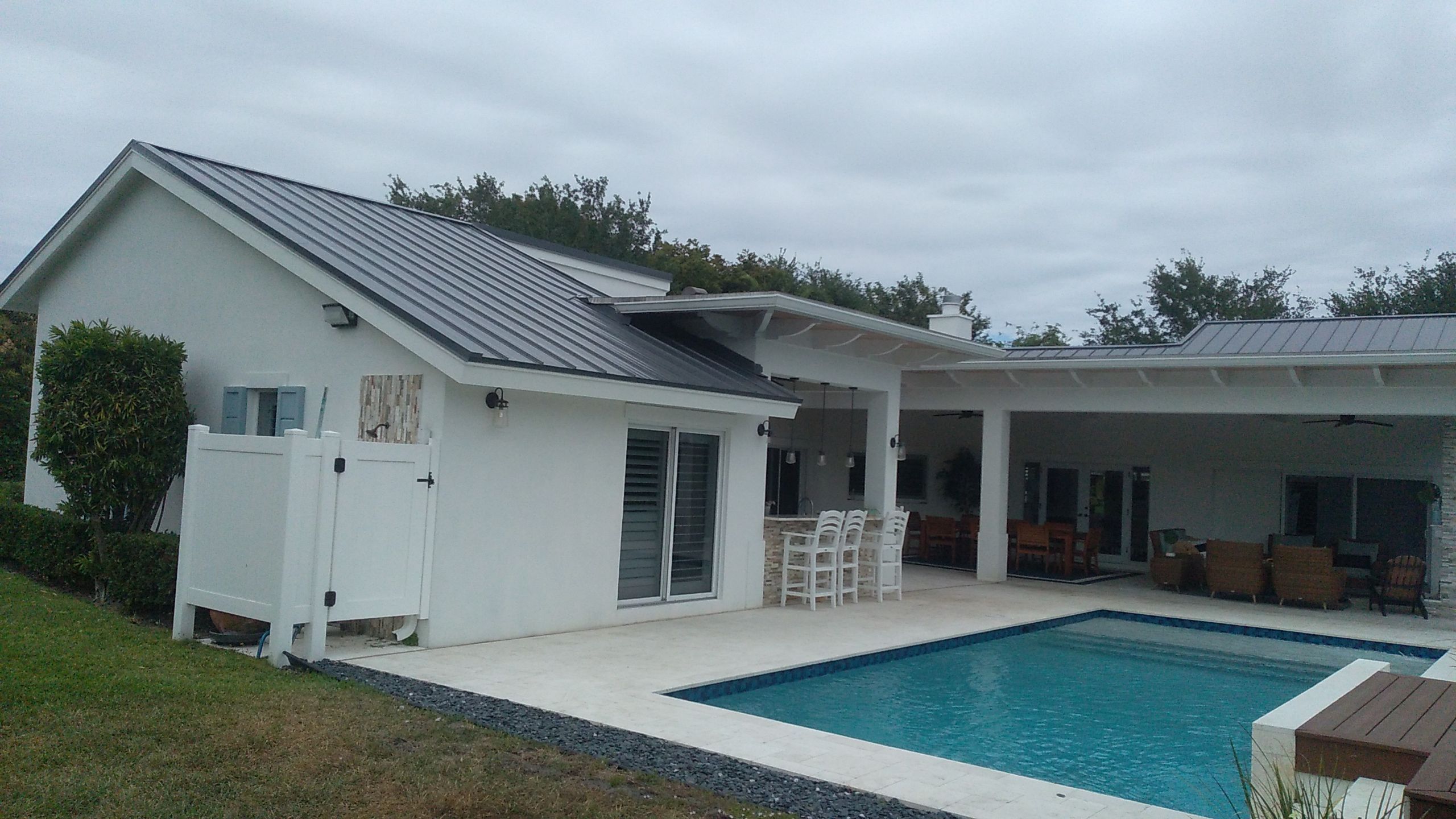Residential Roofing Installation using 1" Nail strip metal roof by BLUES BROTHERS CONSTRUCTION CORP