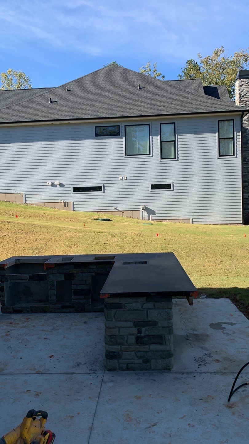 Outdoor Kitchen on Lake Keowee by Xtreme Concrete Services