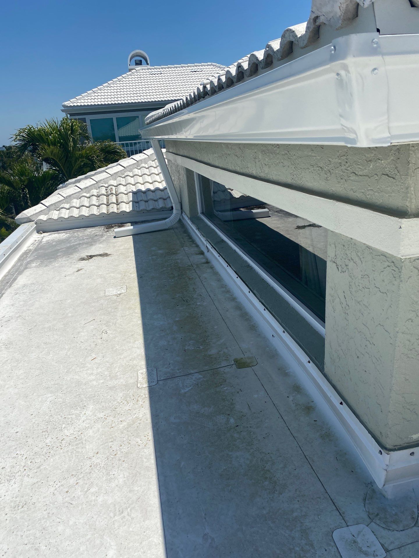 Splash Guard Gutters for Coastal Homes in Longboat Key FL by Gutter Professors