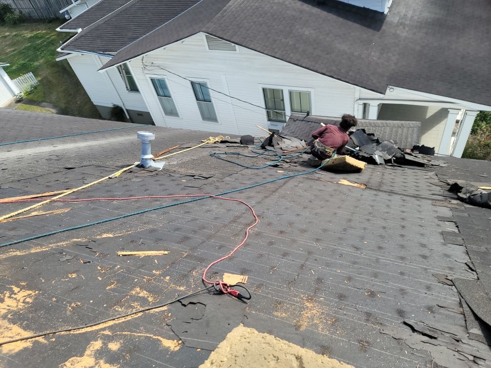 Residential Roofing Installation using Roof Replacement by American Roofing & Construction LLC